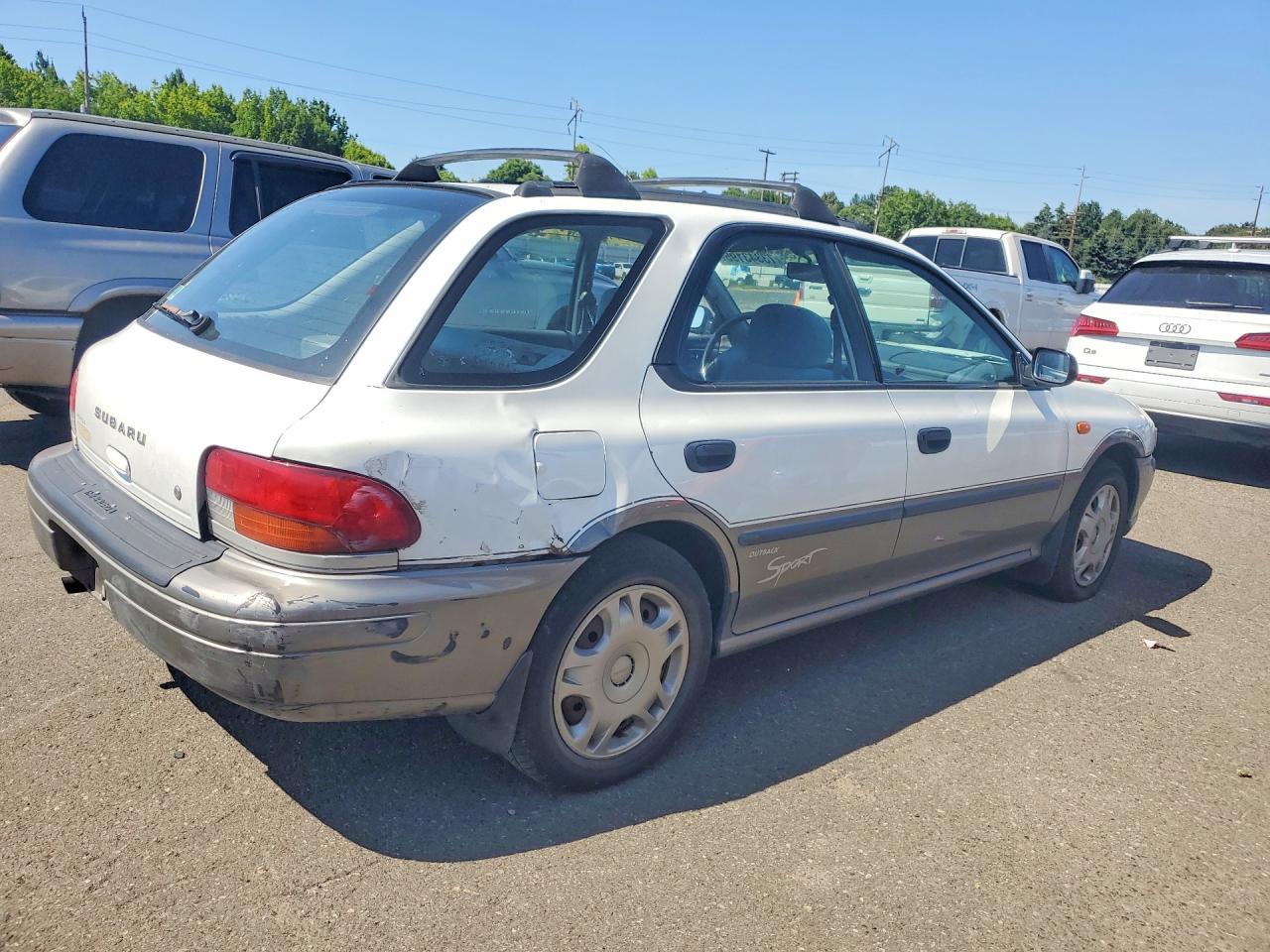 1997 Subaru Impreza Outback White vin: JF1GF4859VH813713