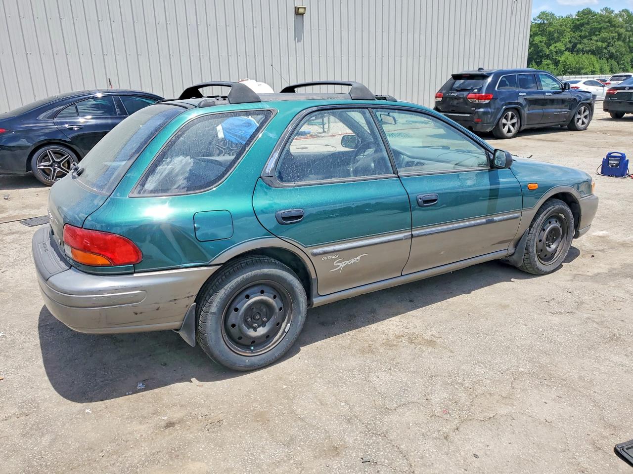 1997 Subaru Impreza Outback Green vin: JF1GF4859VH816322