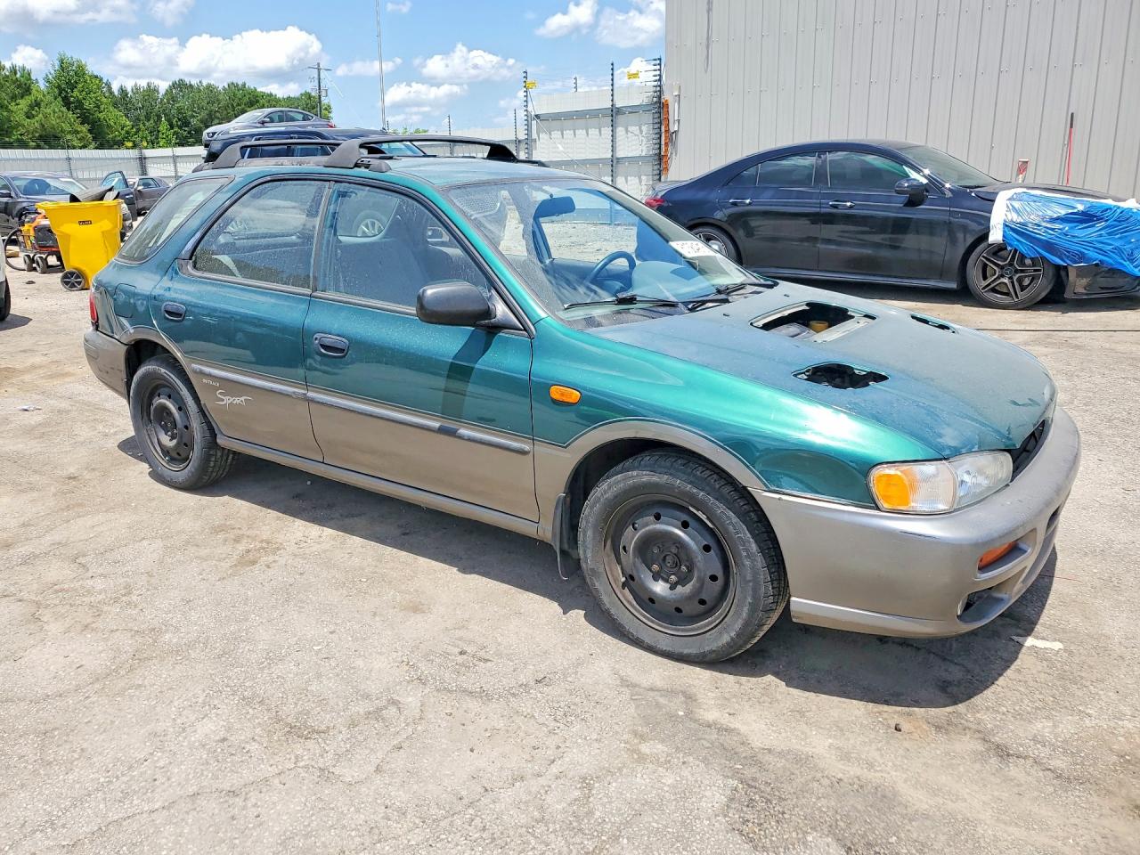 1997 Subaru Impreza Outback Green vin: JF1GF4859VH816322