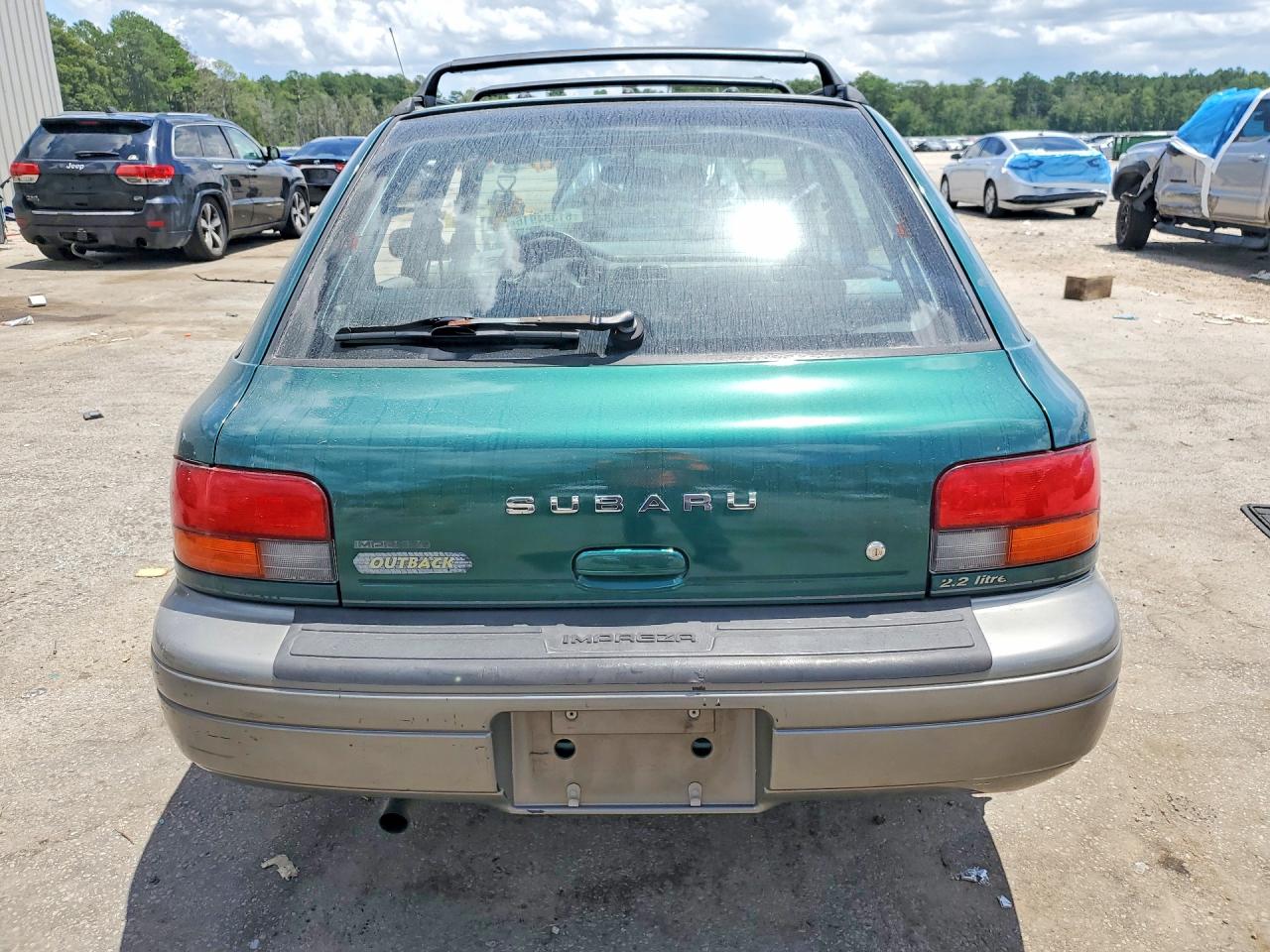 1997 Subaru Impreza Outback Green vin: JF1GF4859VH816322
