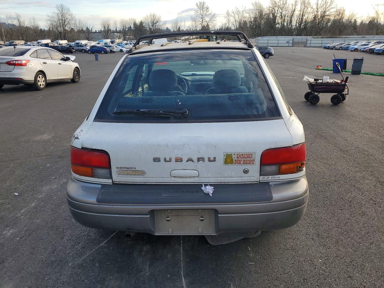 1997 Subaru Impreza Outback White vin: JF1GF4859VH819270