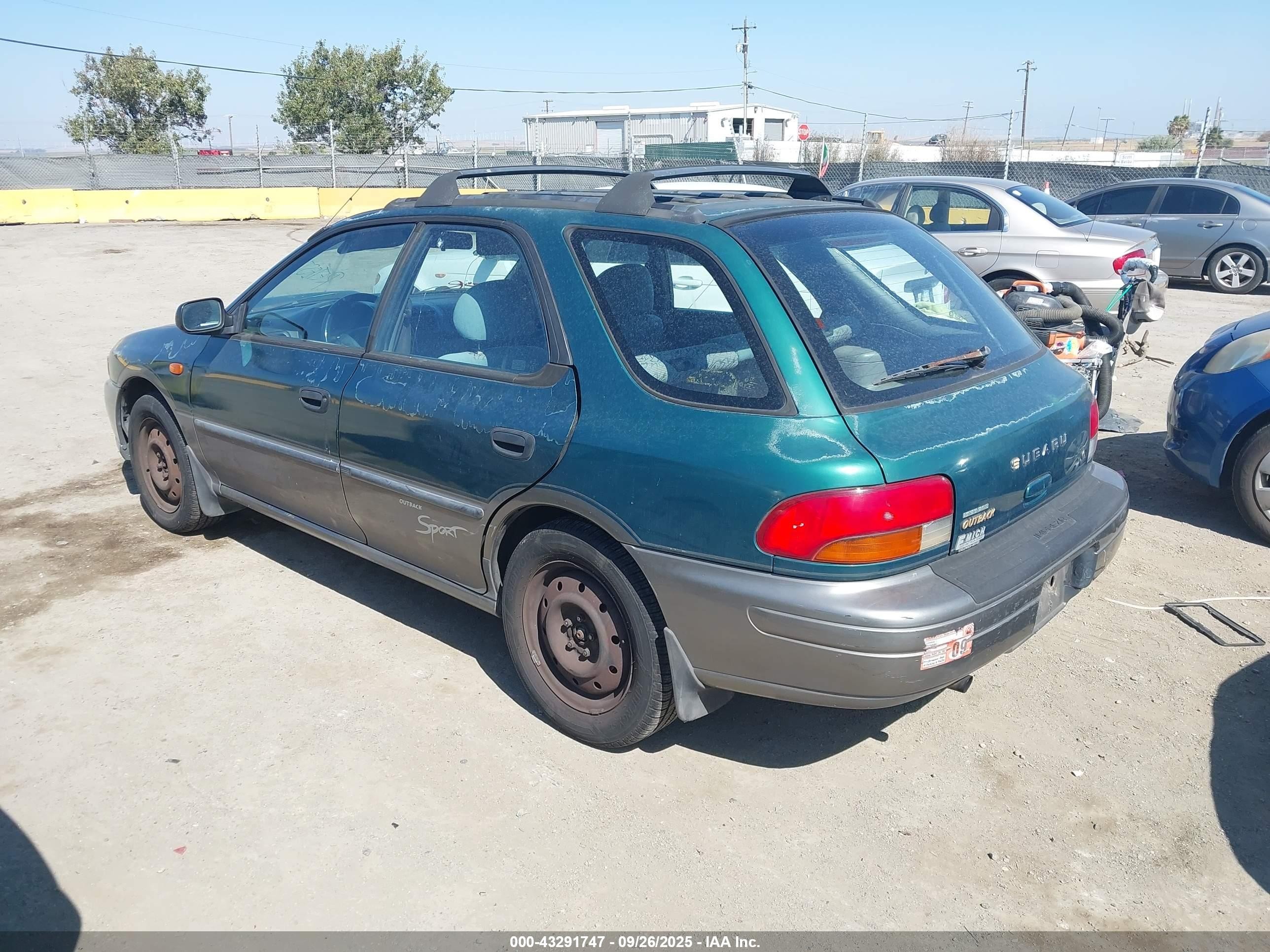 1998 Subaru Impreza Outback Sport Green vin: JF1GF4859WH808528
