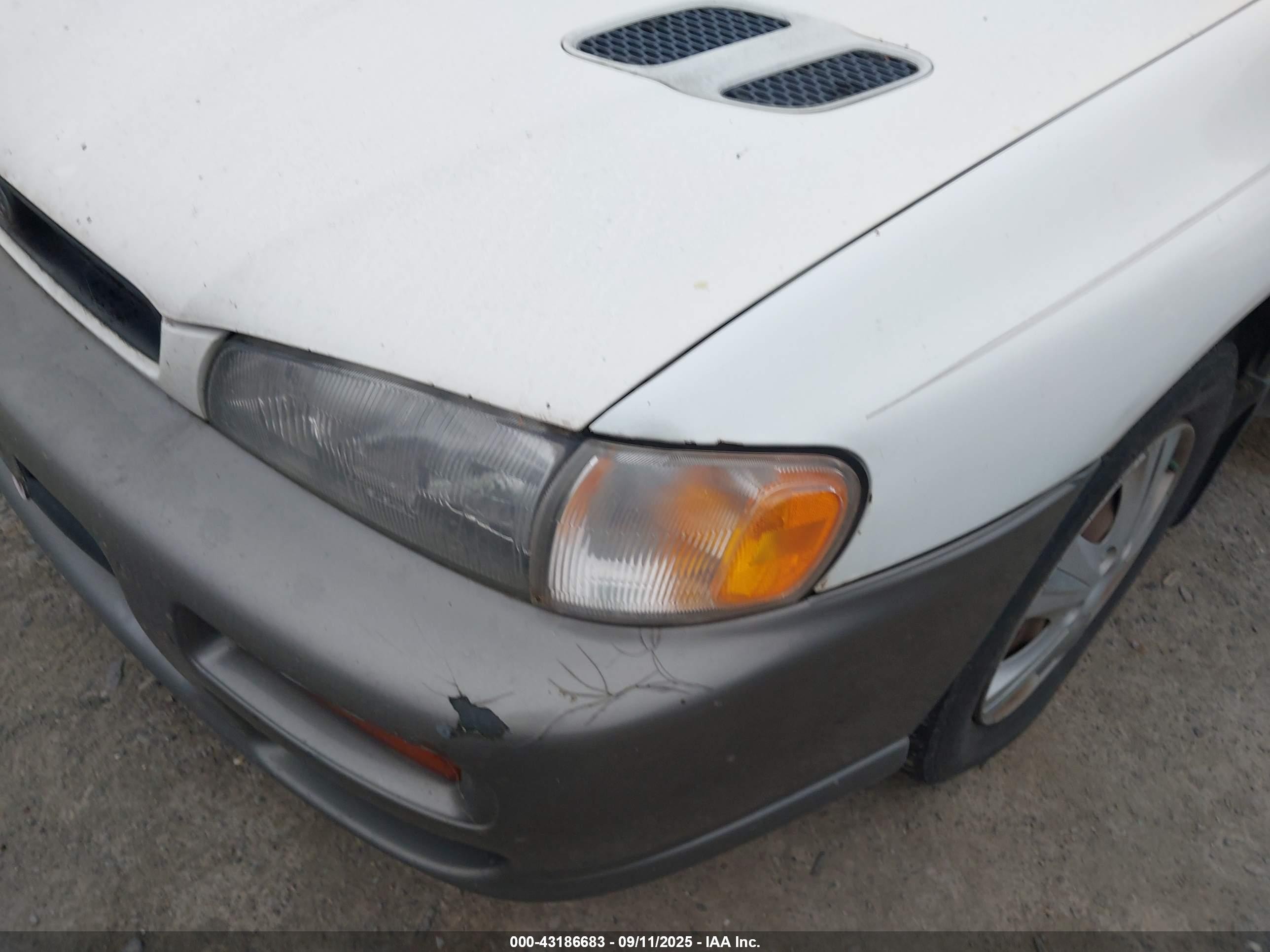 1998 Subaru Impreza Outback Sport White vin: JF1GF4859WH813597