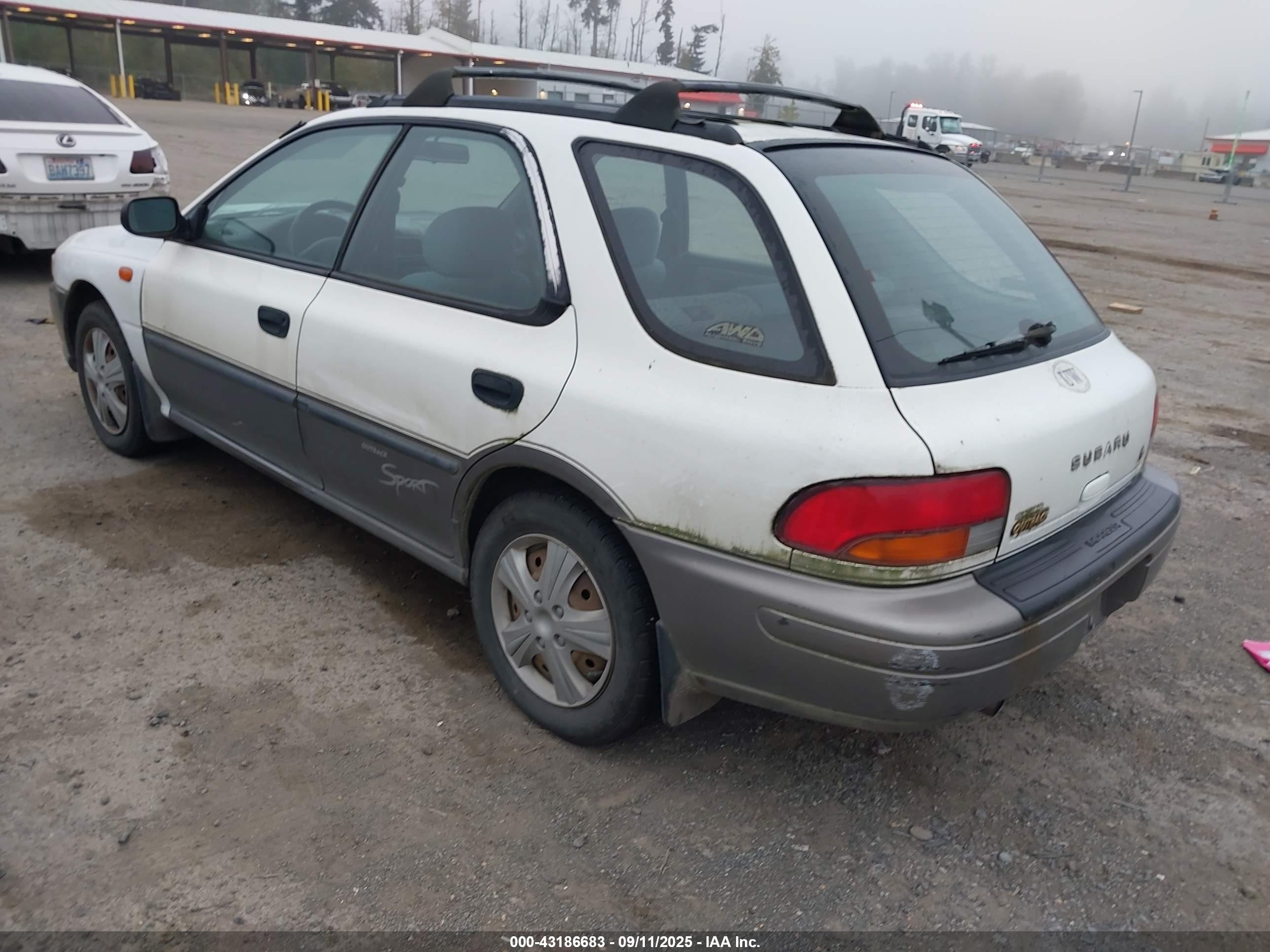 1998 Subaru Impreza Outback Sport White vin: JF1GF4859WH813597