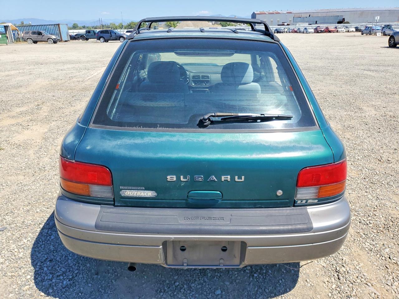 1997 Subaru Impreza Outback Green vin: JF1GF485XVH806365