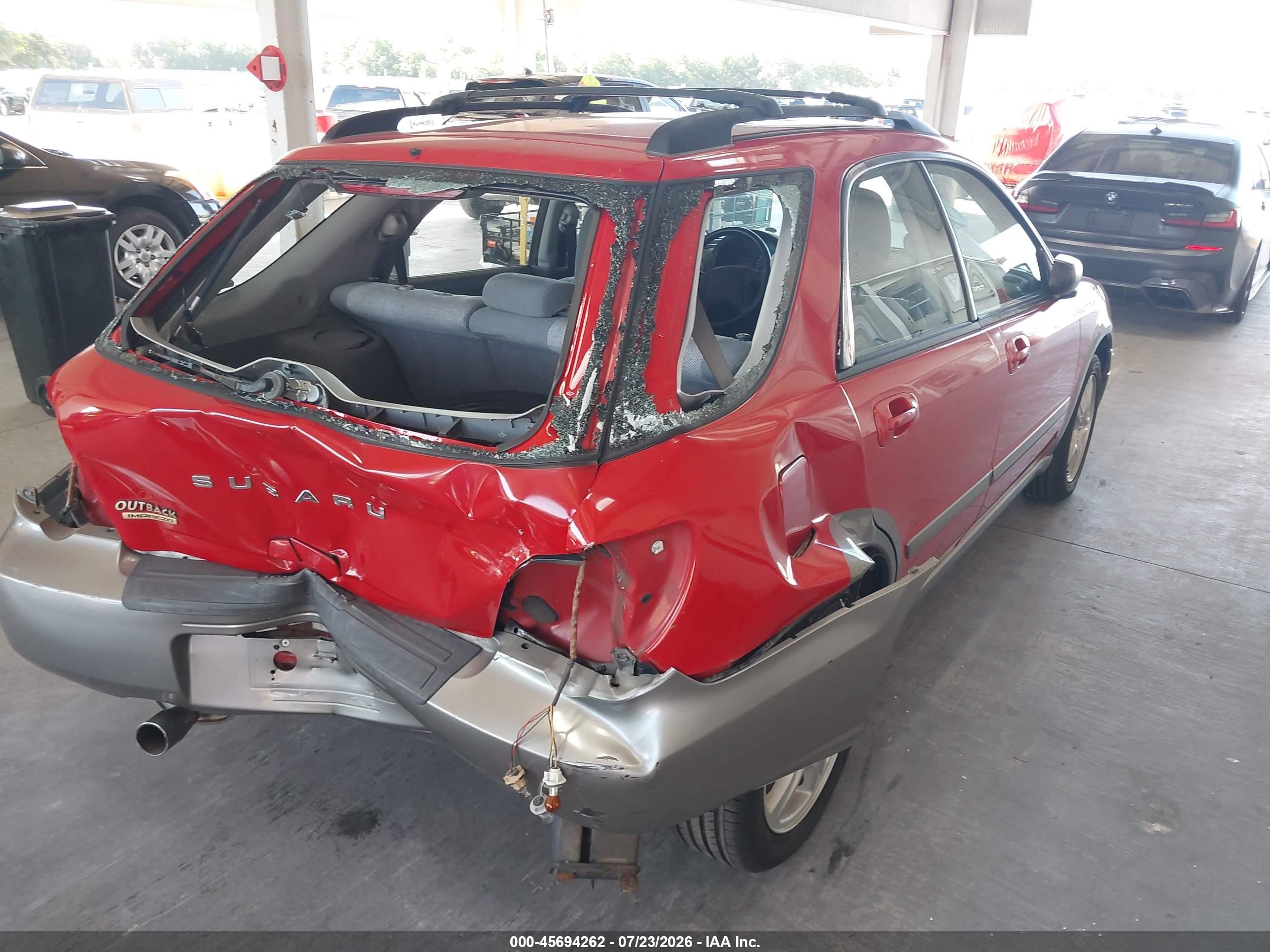 2004 Subaru Impreza Outback Sport   Red vin: JF1GG68554H810010