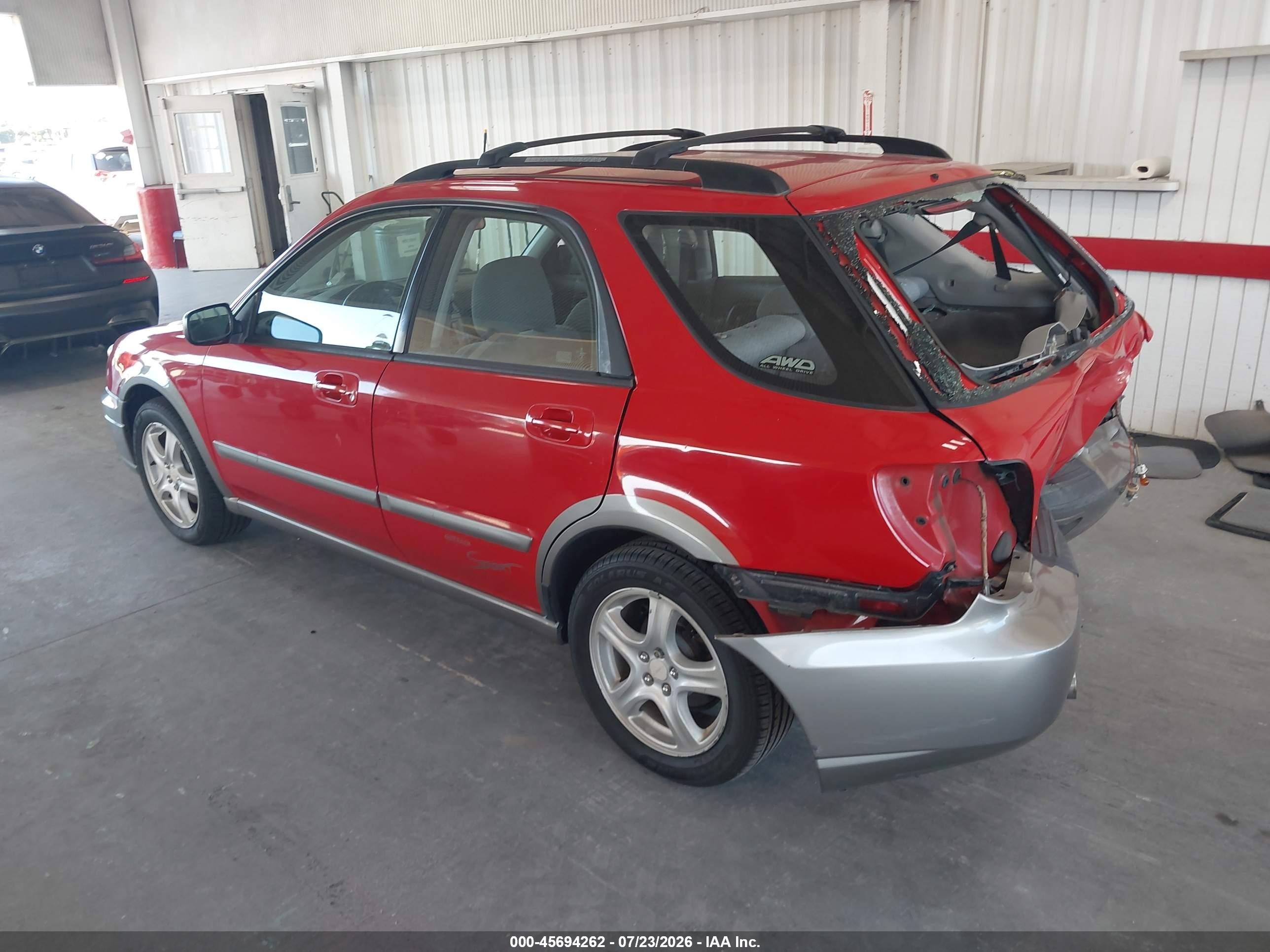 2004 Subaru Impreza Outback Sport   Red vin: JF1GG68554H810010