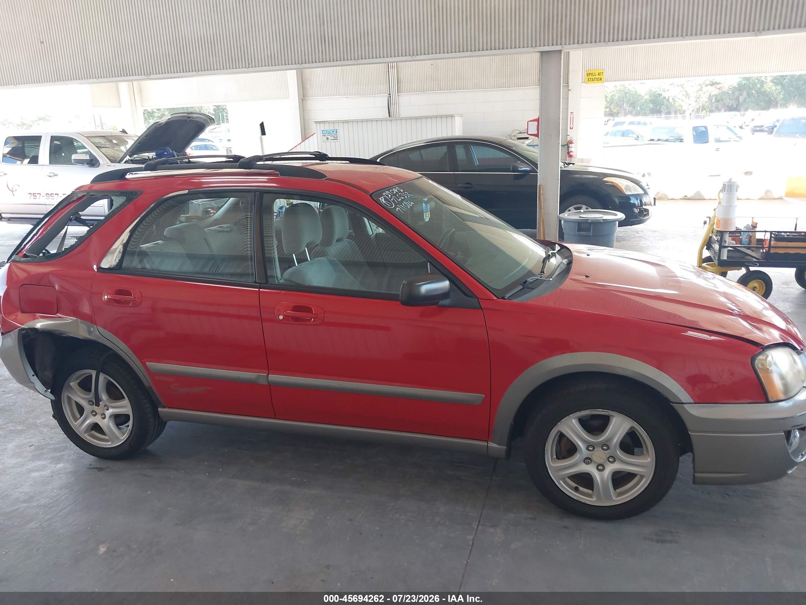 2004 Subaru Impreza Outback Sport   Red vin: JF1GG68554H810010