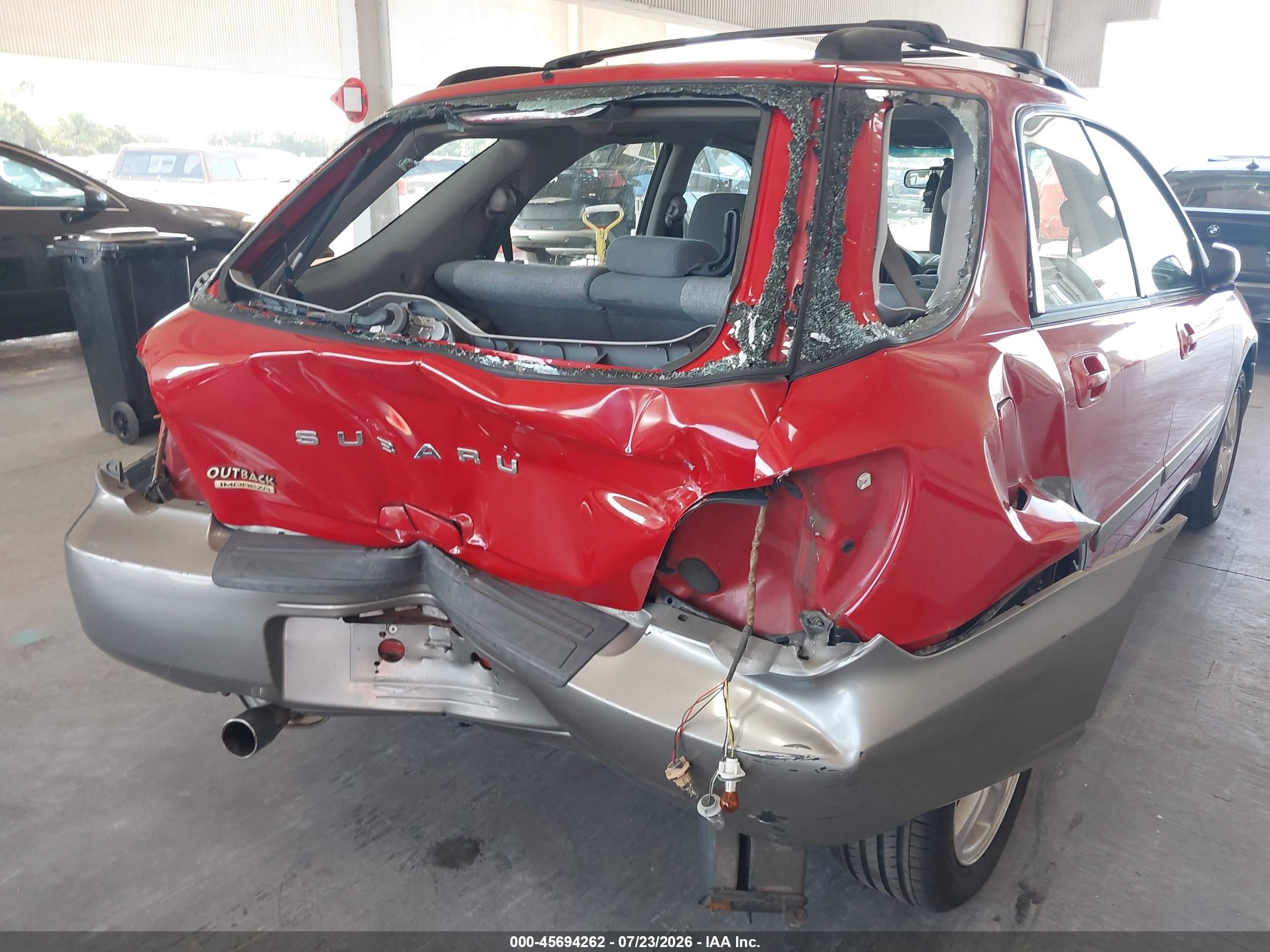 2004 Subaru Impreza Outback Sport   Red vin: JF1GG68554H810010