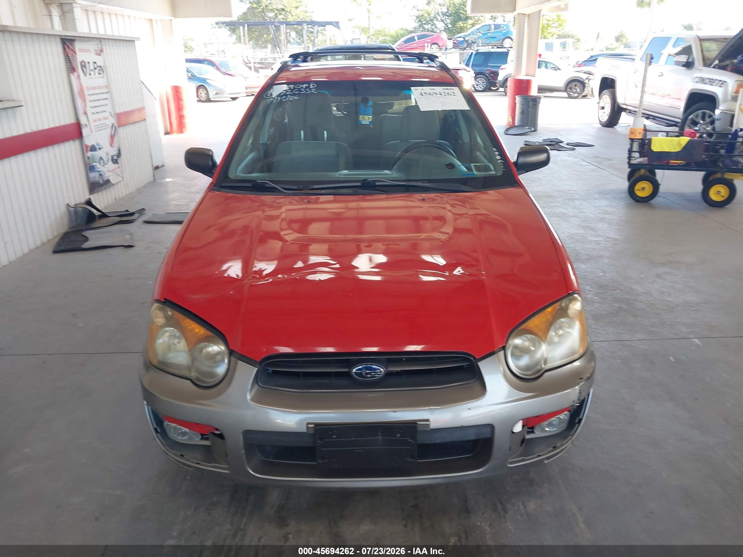 2004 Subaru Impreza Outback Sport   Red vin: JF1GG68554H810010