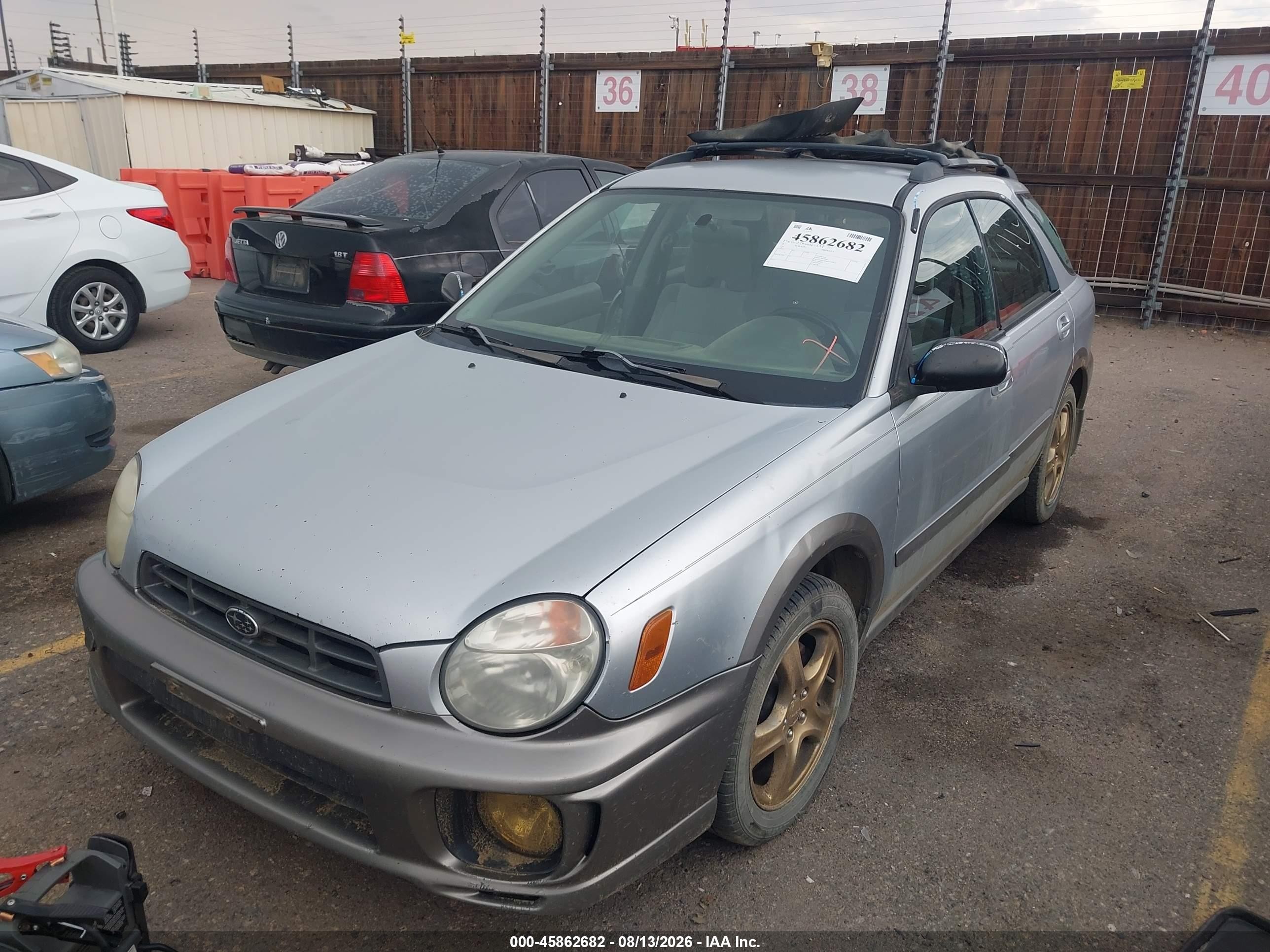 2002 Subaru Impreza Outback Sport   Silver vin: JF1GG68582H820401