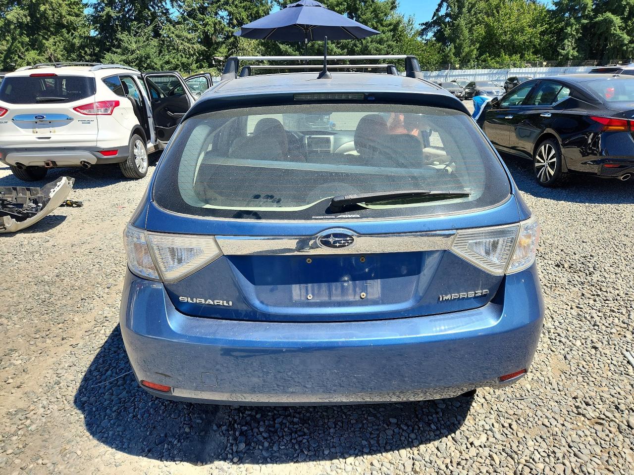 2009 Subaru Impreza 2.5i Premium Blue vin: JF1GH60689H811855