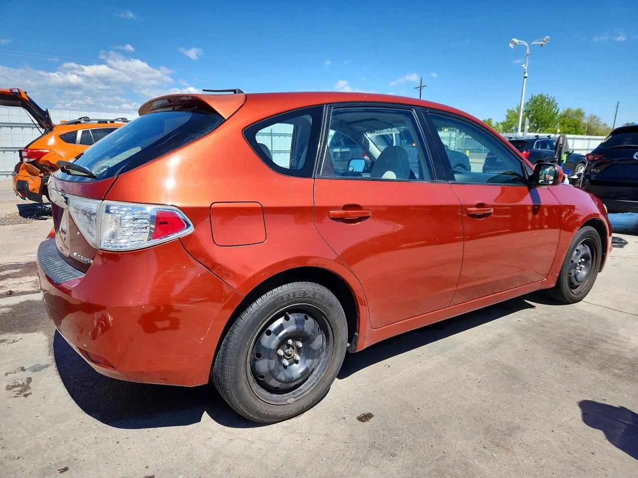 2009 Subaru Impreza 2.5i Orange vin: JF1GH61619H807614