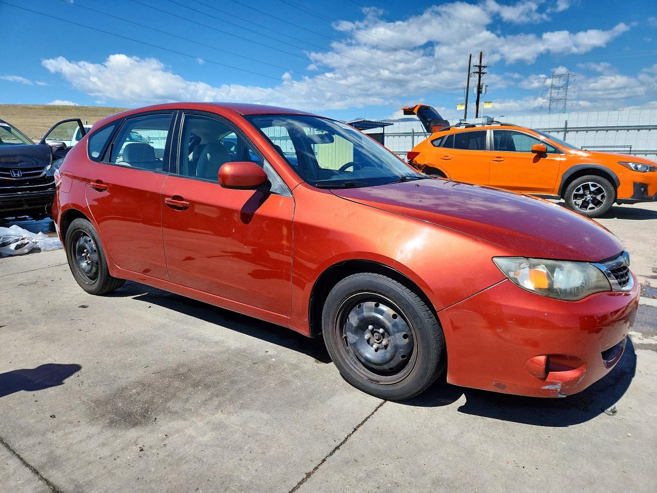 2009 Subaru Impreza 2.5i Orange vin: JF1GH61619H807614