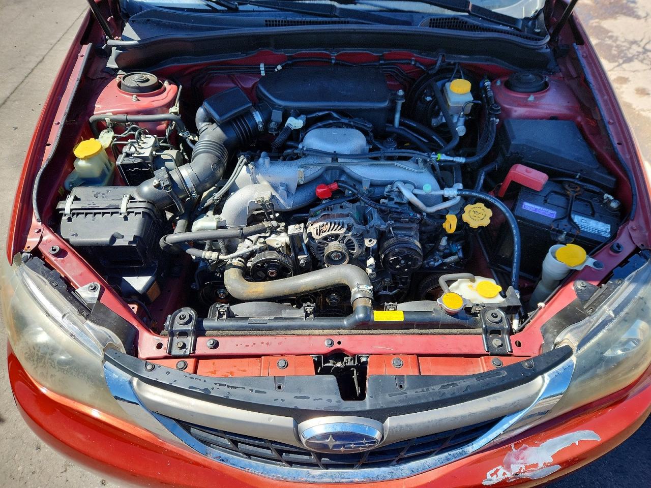 2009 Subaru Impreza 2.5i Orange vin: JF1GH61619H807614