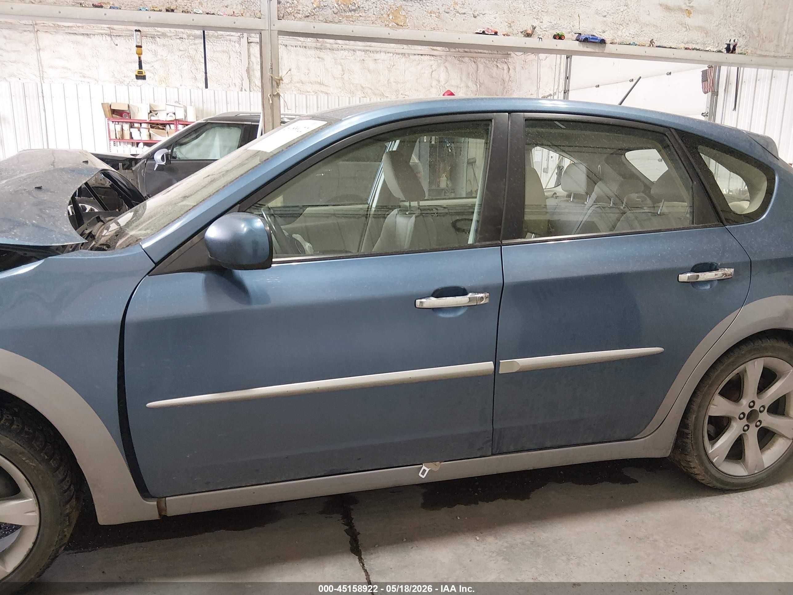 2009 Subaru Impreza Outback Sport   Blue vin: JF1GH63699H825212
