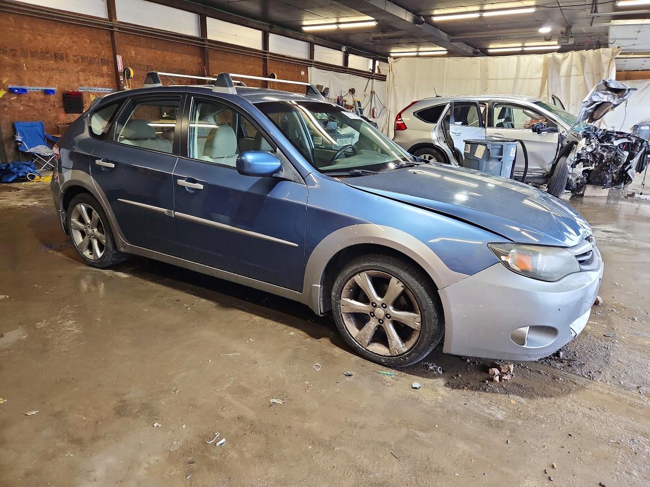 2010 Subaru Impreza Outback Sport Blue vin: JF1GH6D65AH823038