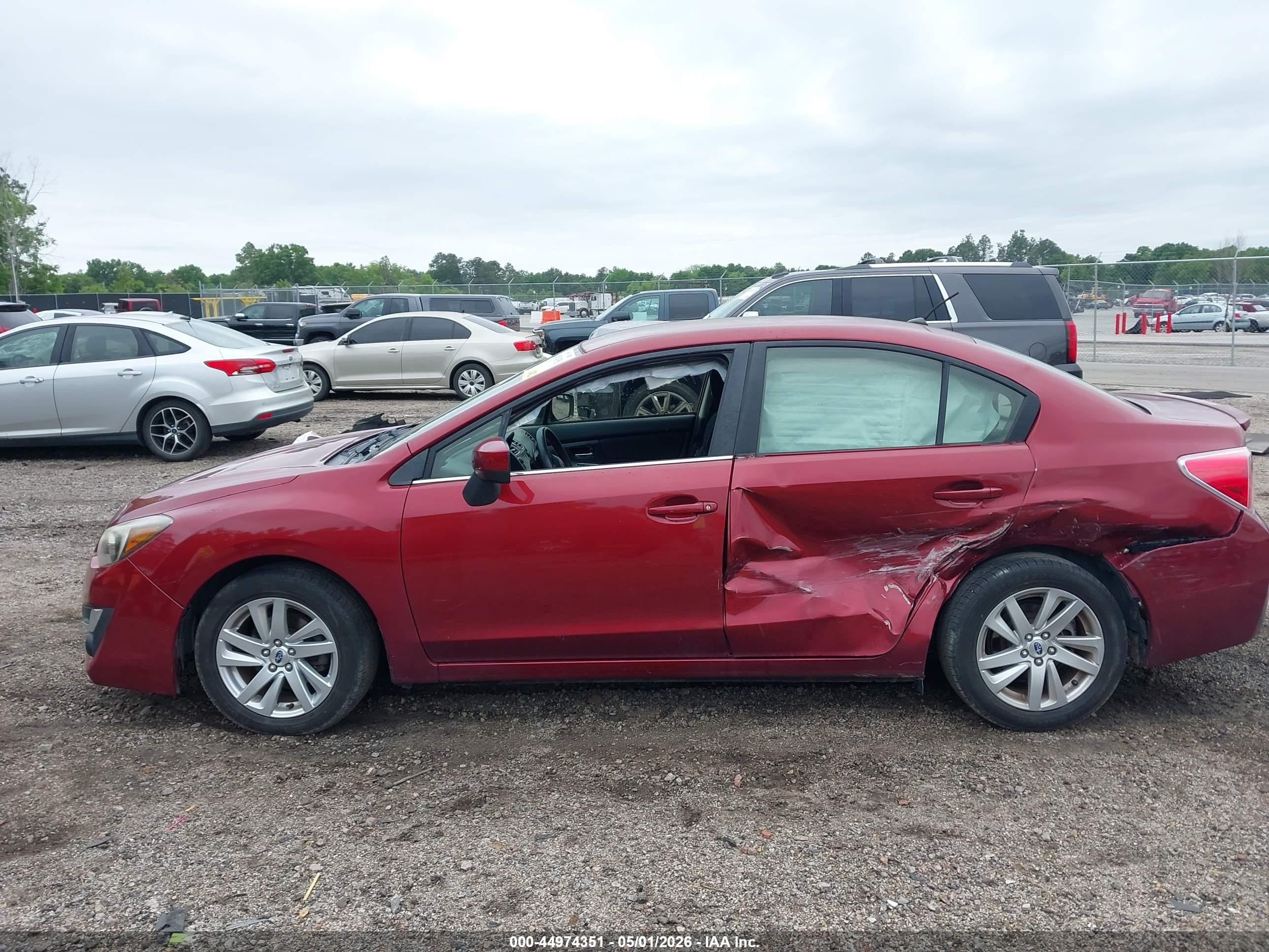 2016 Subaru Impreza 2.0i Premium Red vin: JF1GJAB64GH022541