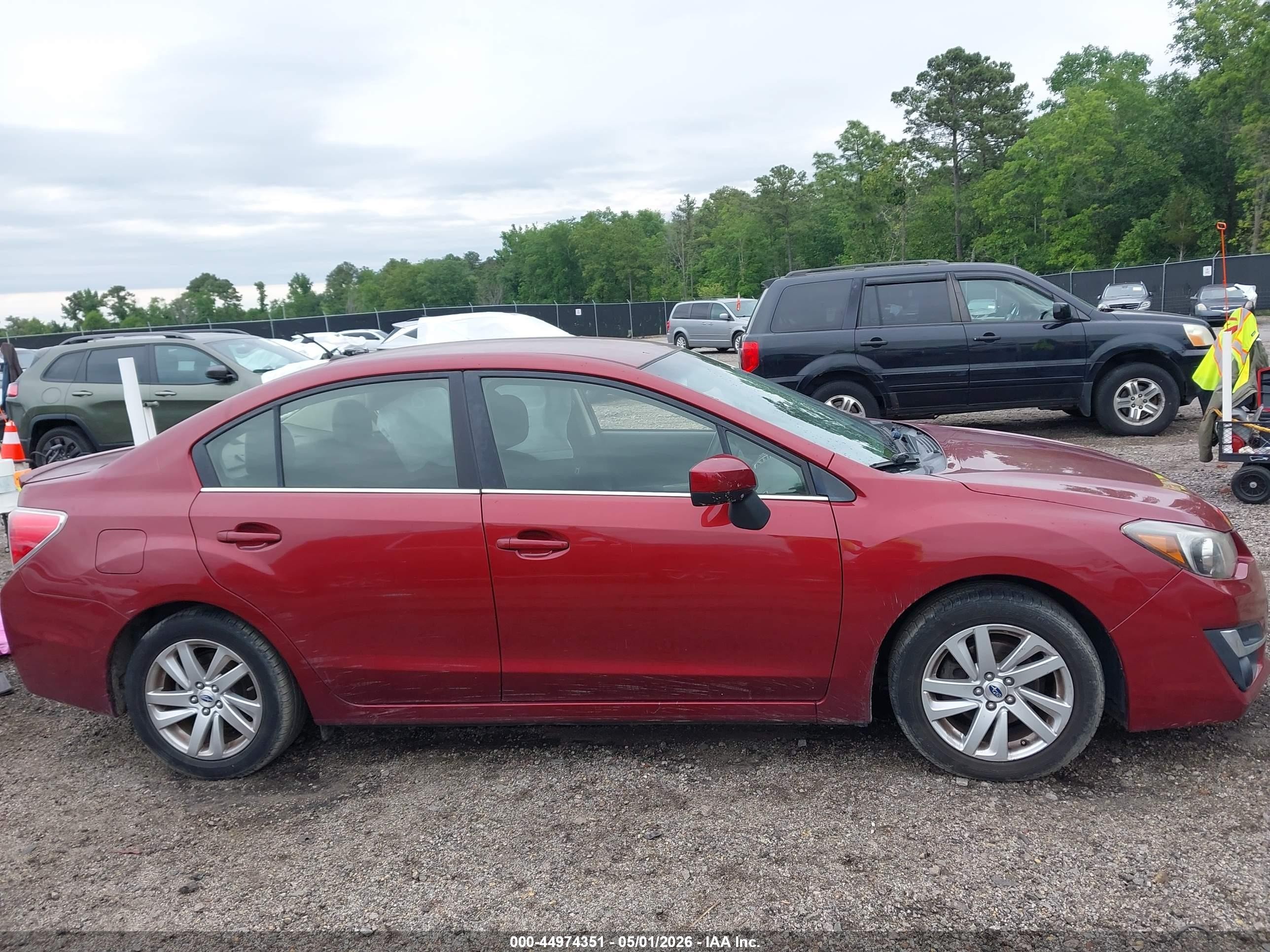 2016 Subaru Impreza 2.0i Premium Red vin: JF1GJAB64GH022541