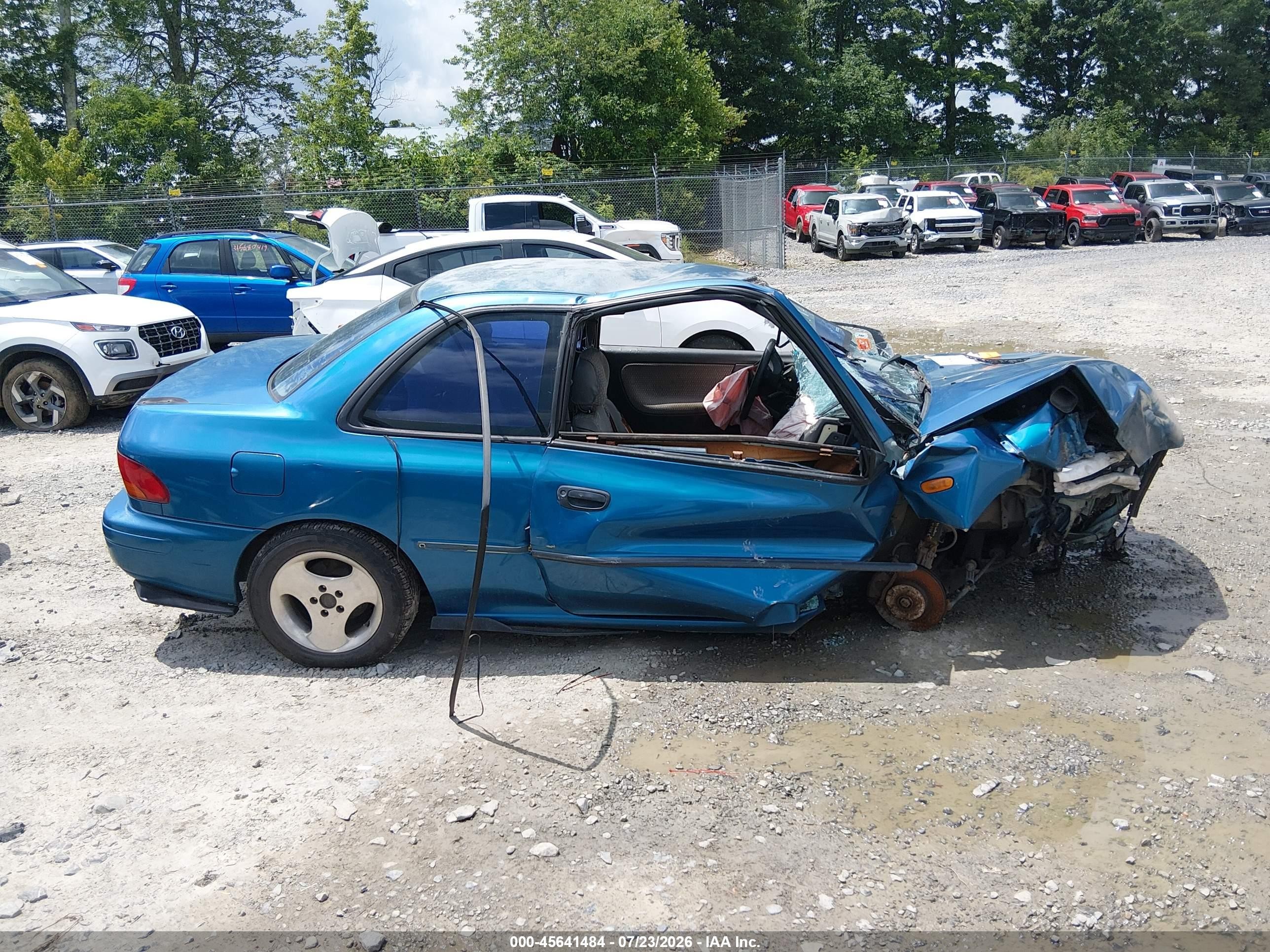 1997 Subaru Impreza Brighton Blue vin: JF1GM2255VG401166