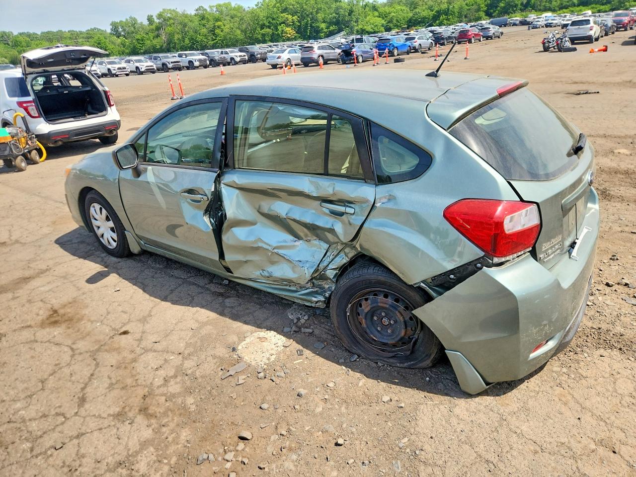 2014 Subaru Impreza Teal vin: JF1GPAA60E8253272