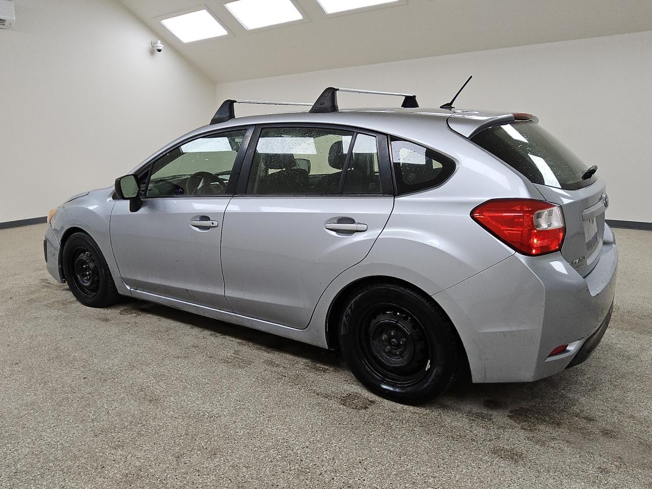 2014 Subaru Impreza Серый vin: JF1GPAA63E9284414 Damage: Left Front Wheel Cover, Missing, Replacement Required