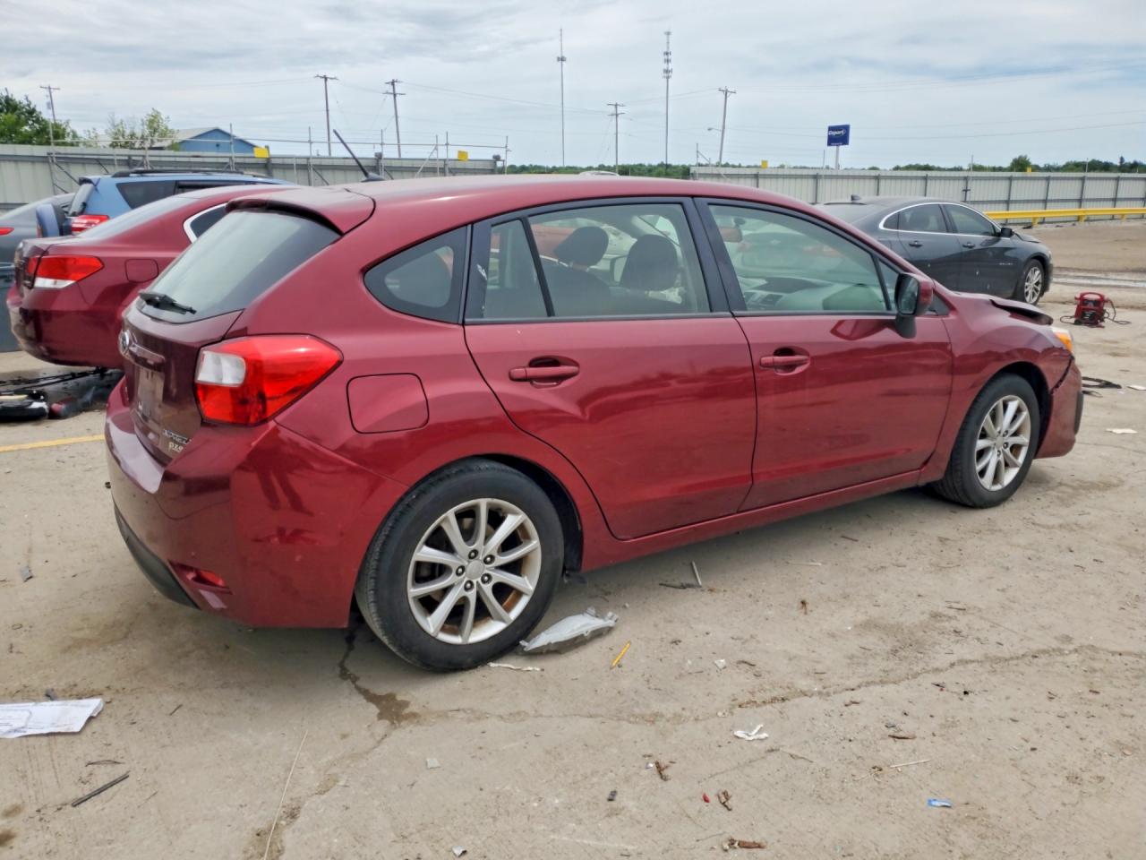 2012 Subaru Impreza Premium Burgundy vin: JF1GPAB67CH245178