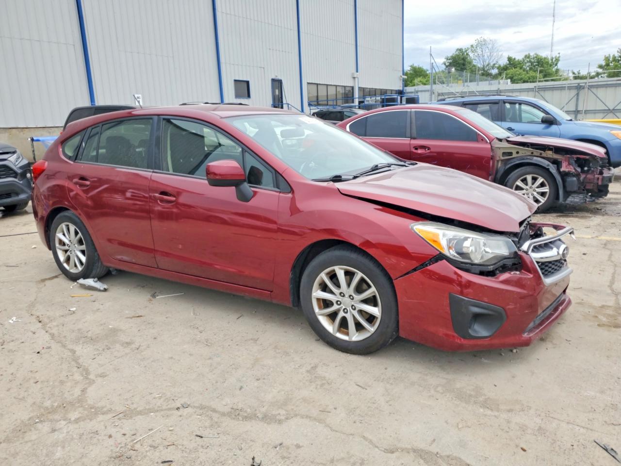 2012 Subaru Impreza Premium Burgundy vin: JF1GPAB67CH245178