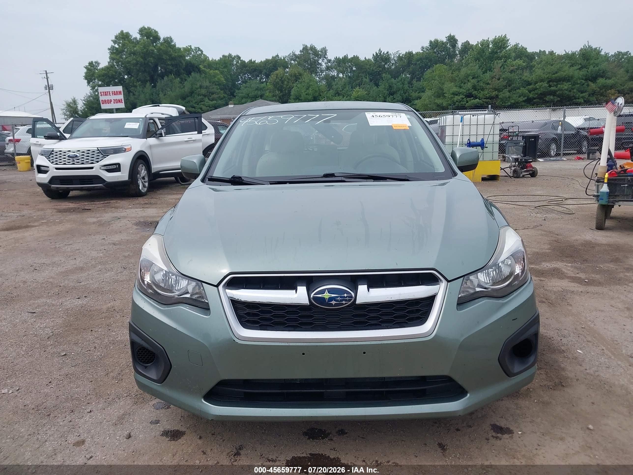 2014 Subaru Impreza 2.0i Premium Green vin: JF1GPAC62E8261936