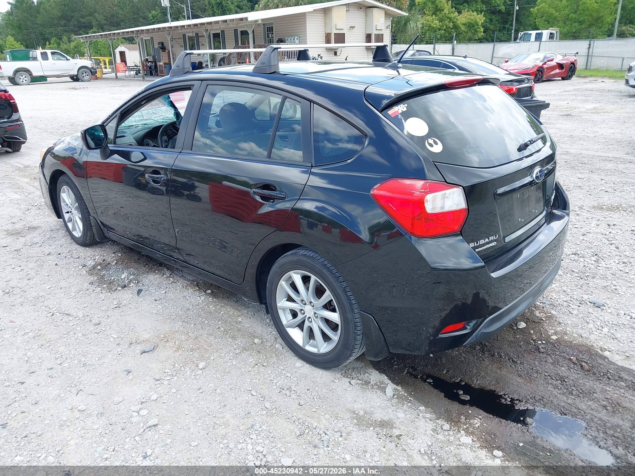 2012 Subaru Impreza 2.0i Premium Black vin: JF1GPAC6XCH208673