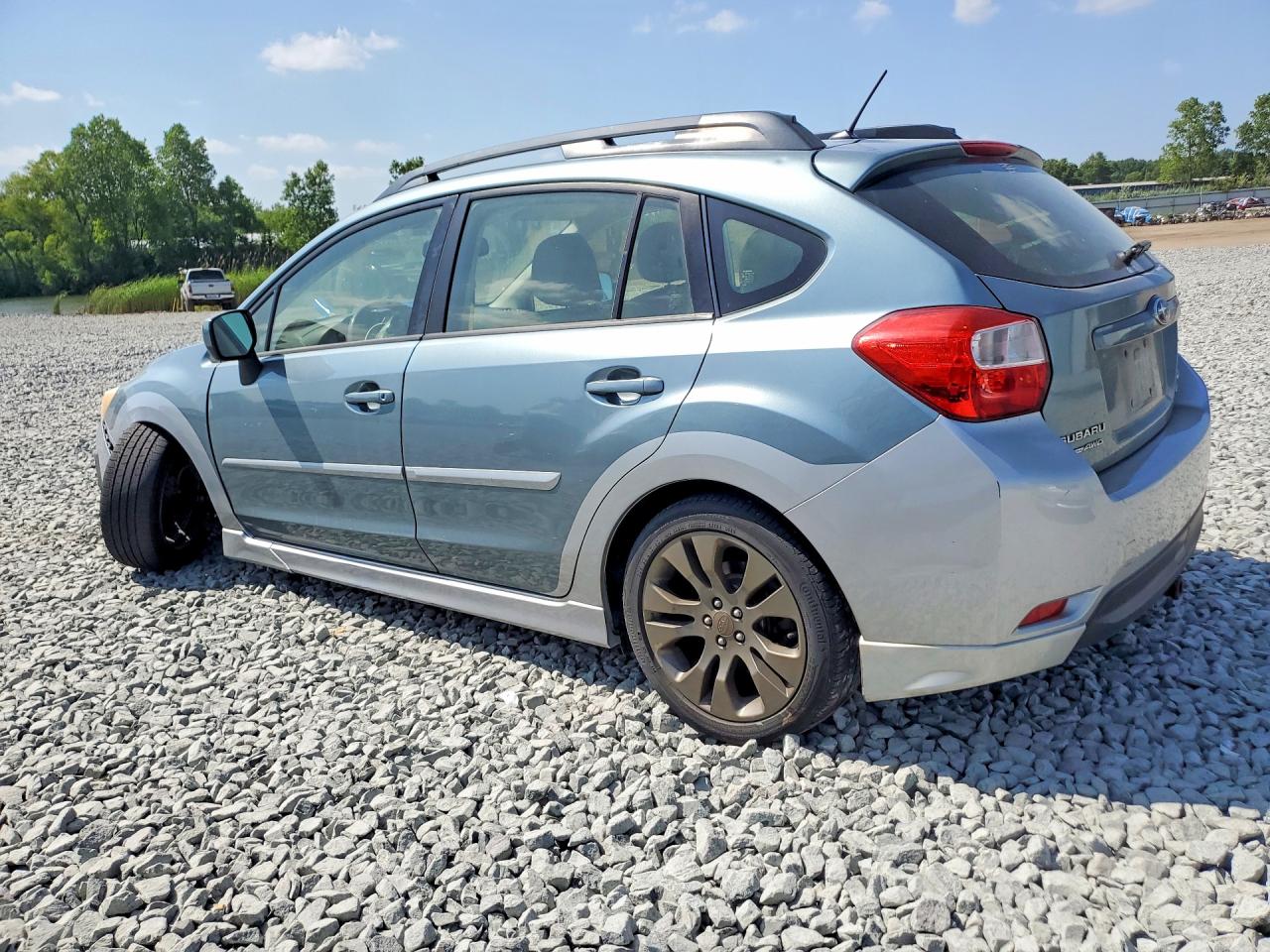 2012 Subaru Impreza Sport Premium Teal vin: JF1GPAL60CH245912