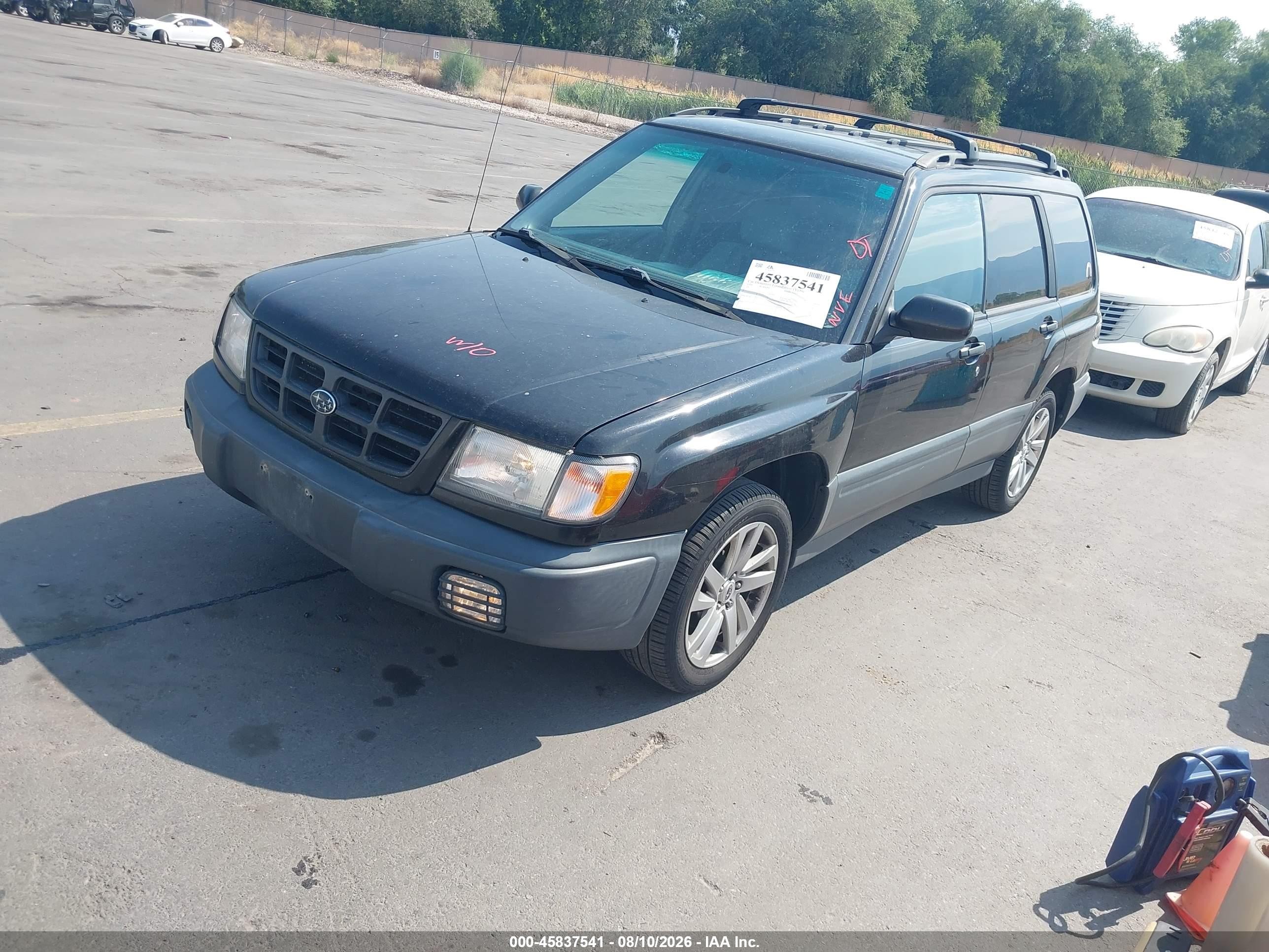 1999 Subaru Forester L Black vin: JF1SF6352XH716952