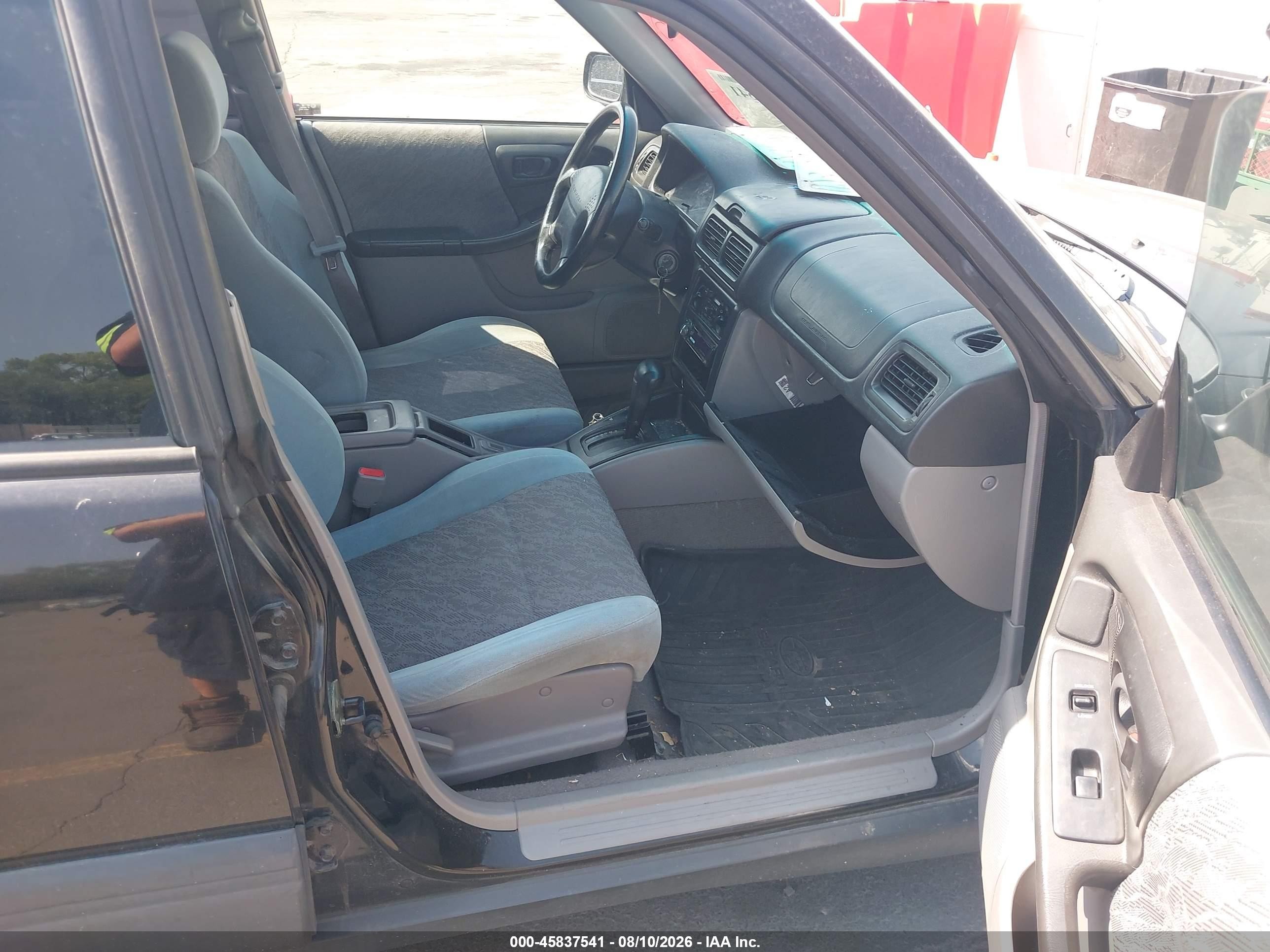 1999 Subaru Forester L Black vin: JF1SF6352XH716952