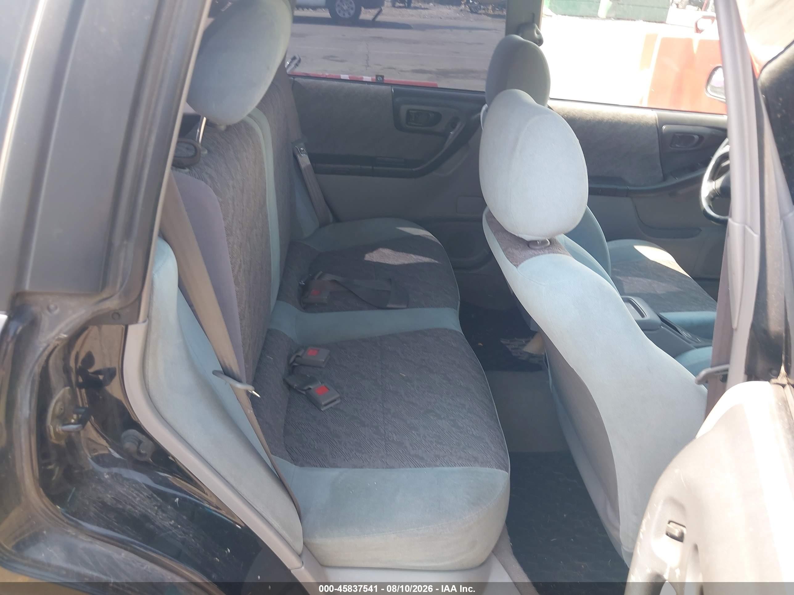 1999 Subaru Forester L Black vin: JF1SF6352XH716952