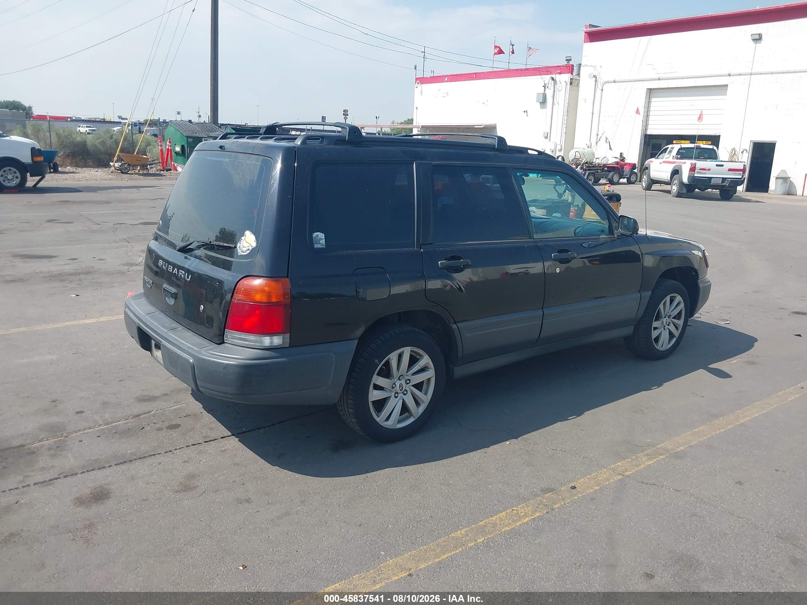 1999 Subaru Forester L Black vin: JF1SF6352XH716952