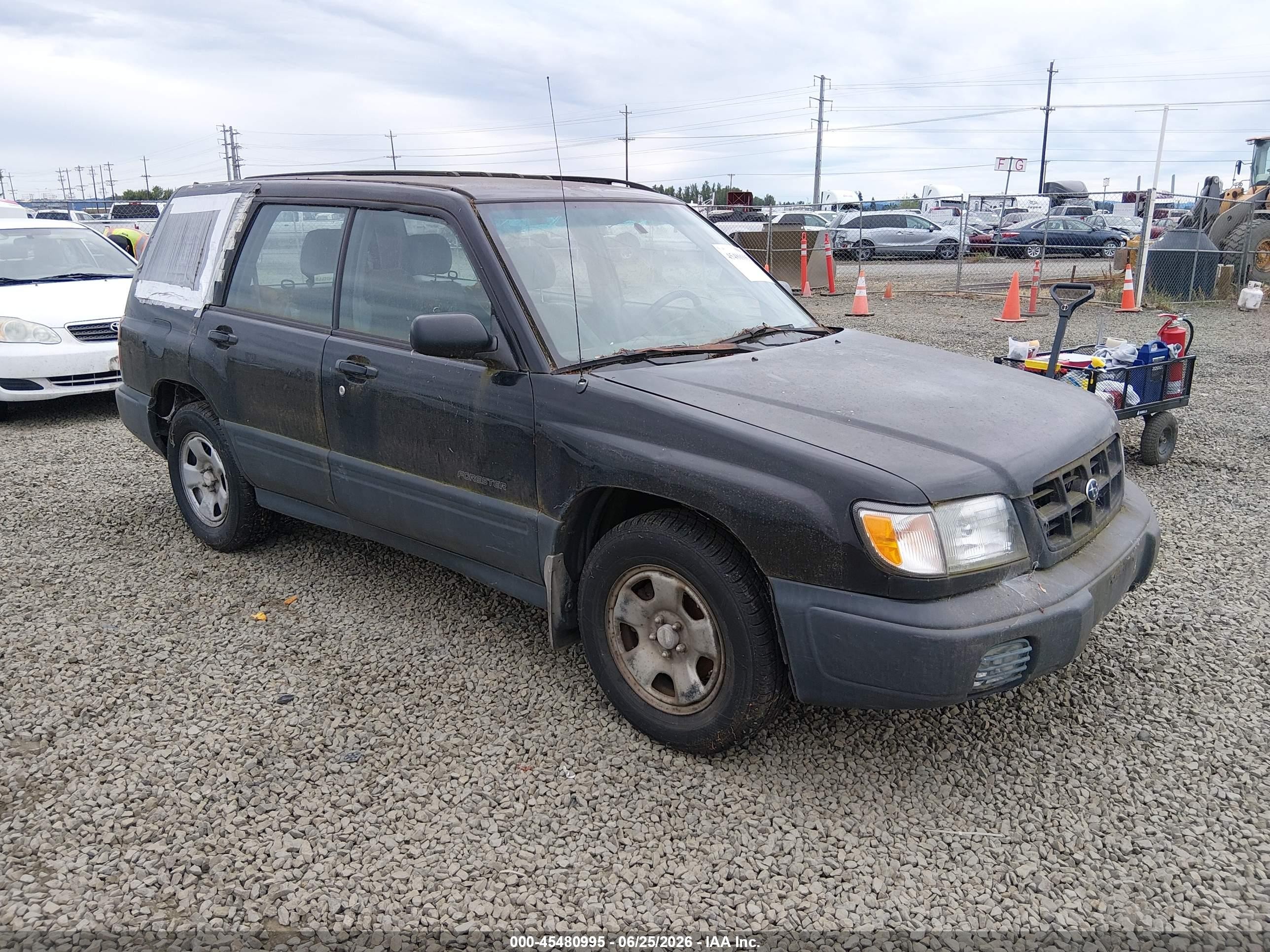 1999 Subaru Forester L Black vin: JF1SF6356XG741021