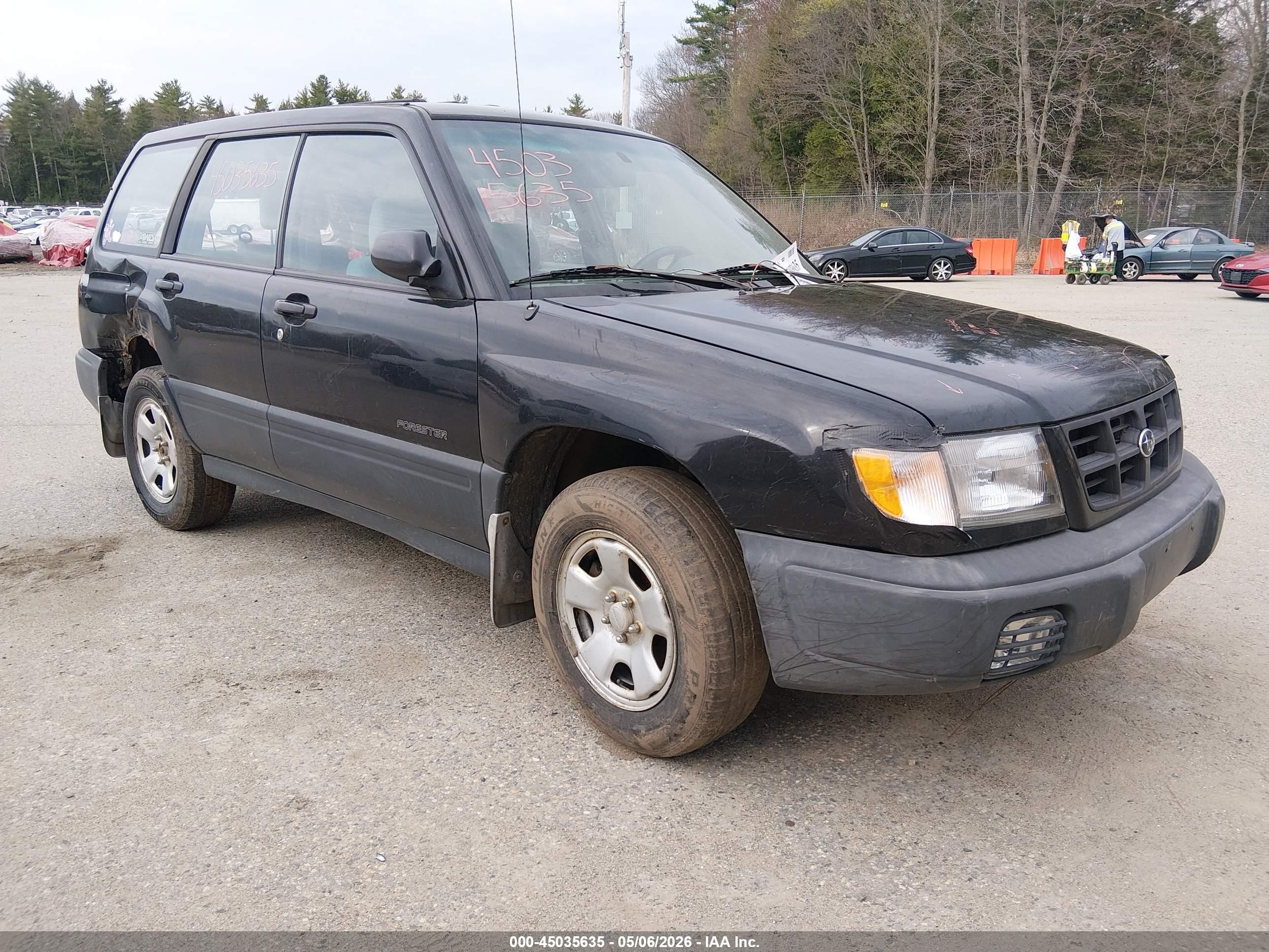 1999 Subaru Forester L Black vin: JF1SF6357XH744844