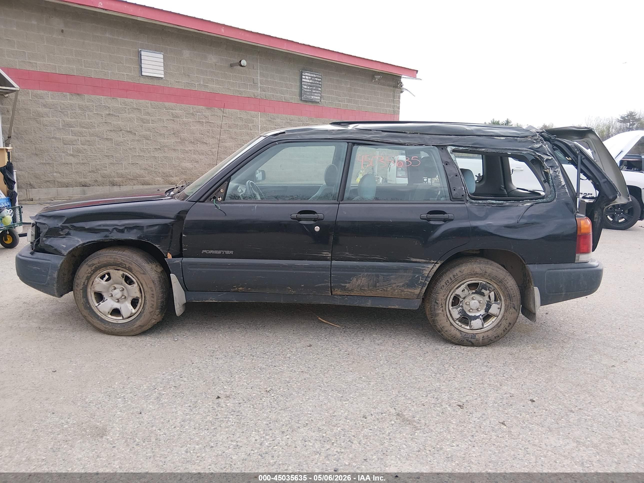 1999 Subaru Forester L Black vin: JF1SF6357XH744844