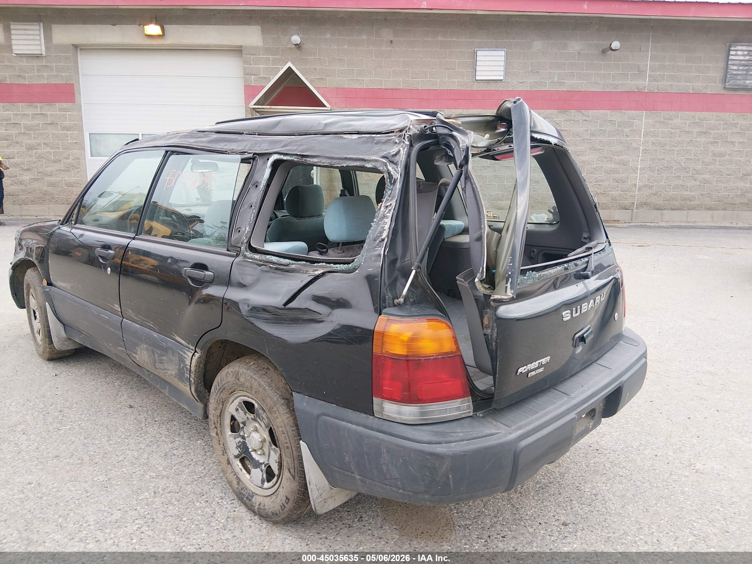 1999 Subaru Forester L Black vin: JF1SF6357XH744844