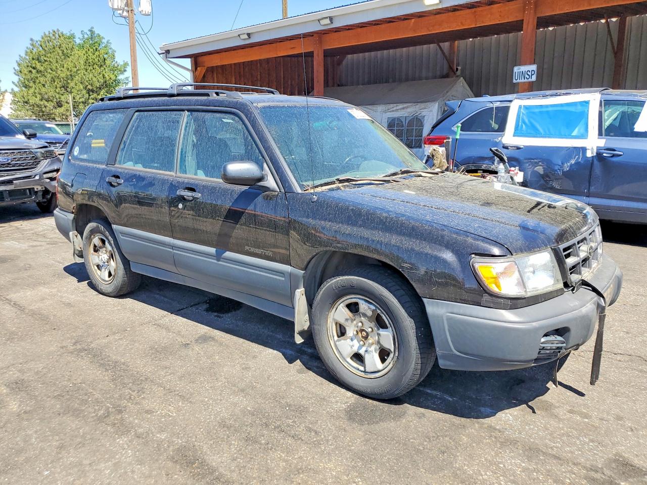 2000 Subaru Forester L Black vin: JF1SF6358YG719474