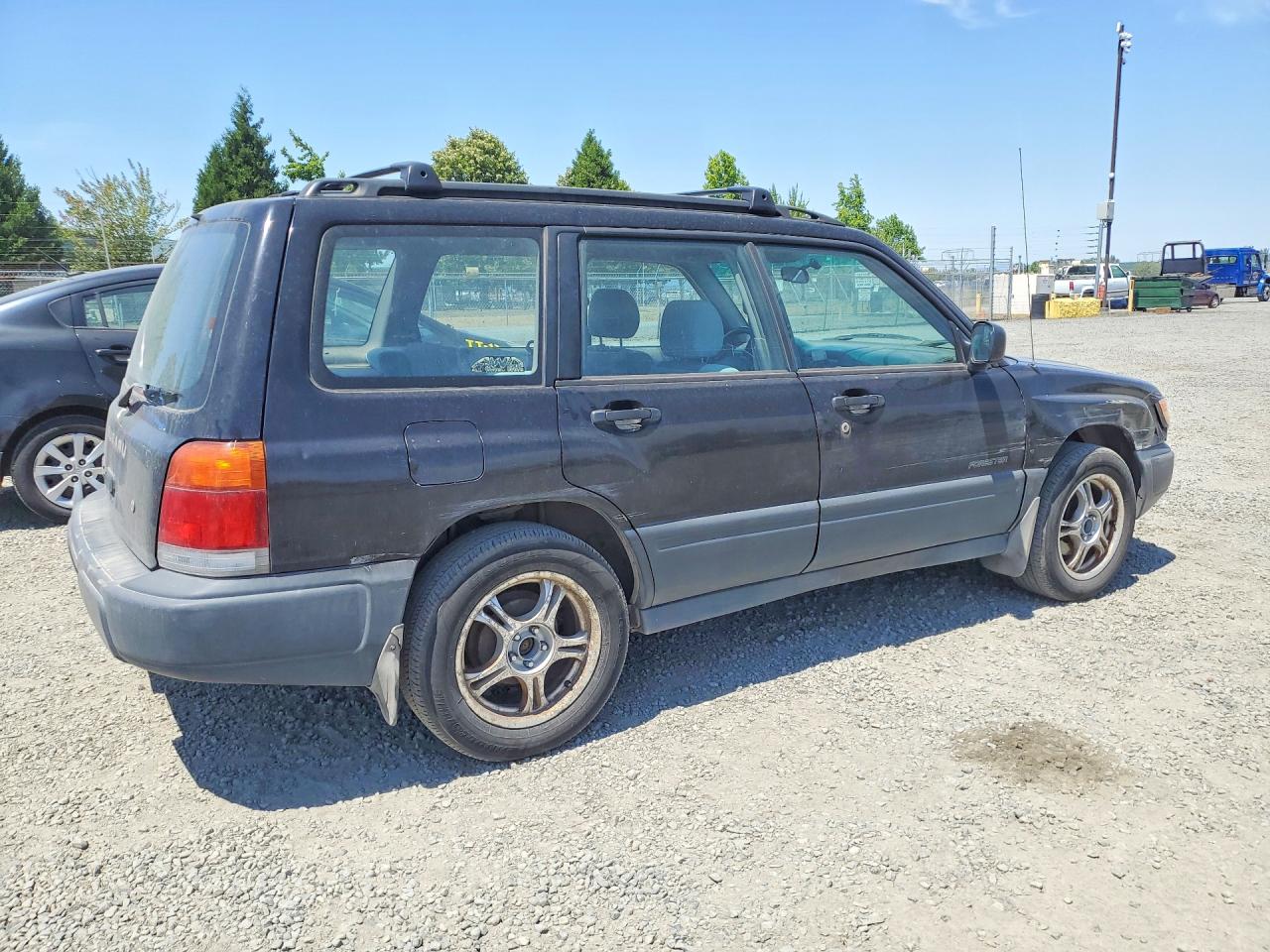 1998 Subaru Forester L Black vin: JF1SF6359WG781561