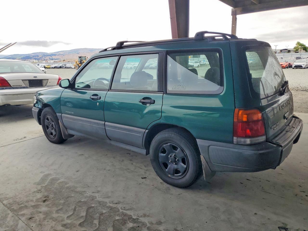 1999 Subaru Forester L Green vin: JF1SF635XXH747527