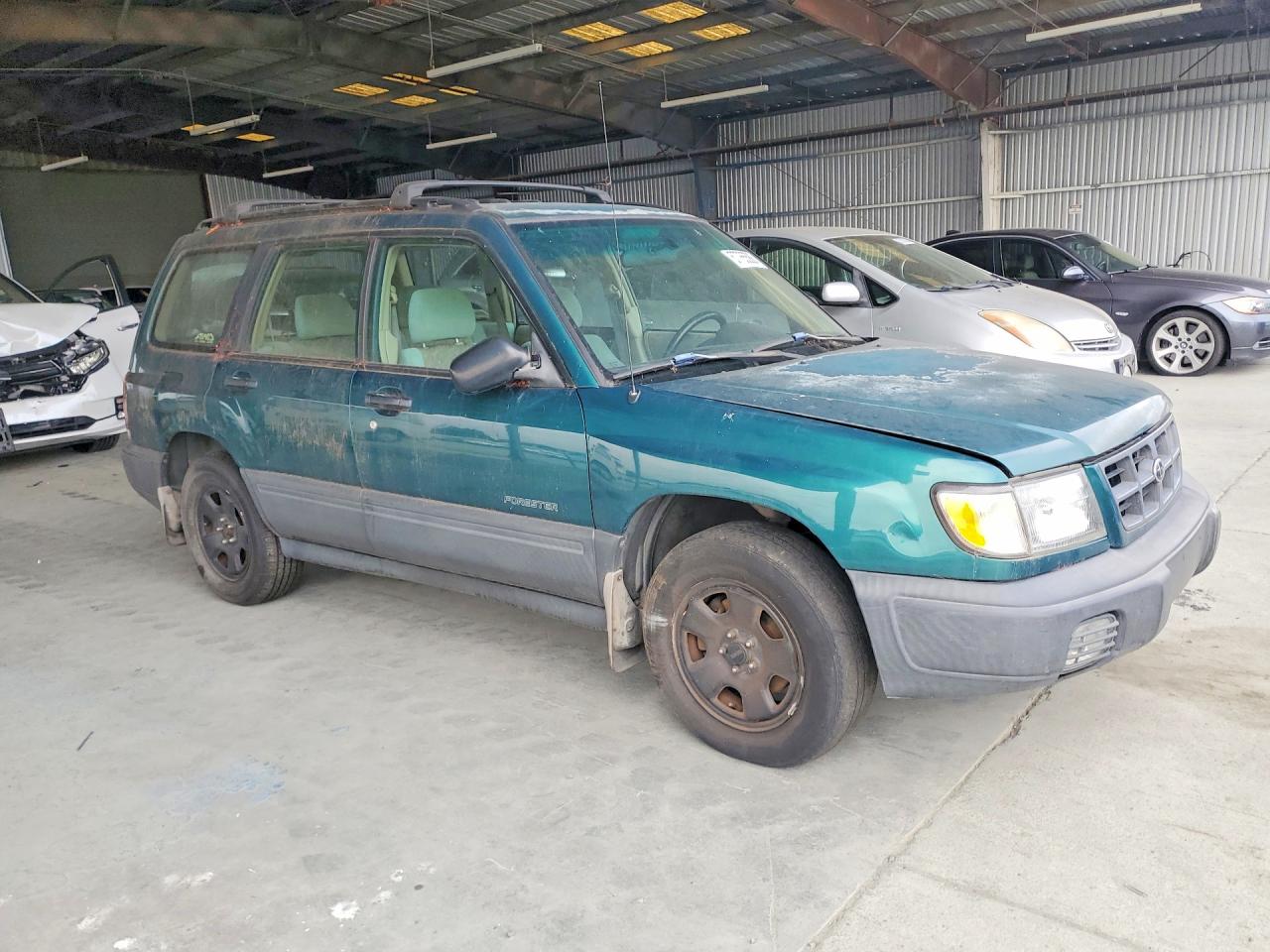 1999 Subaru Forester L Green vin: JF1SF635XXH747527