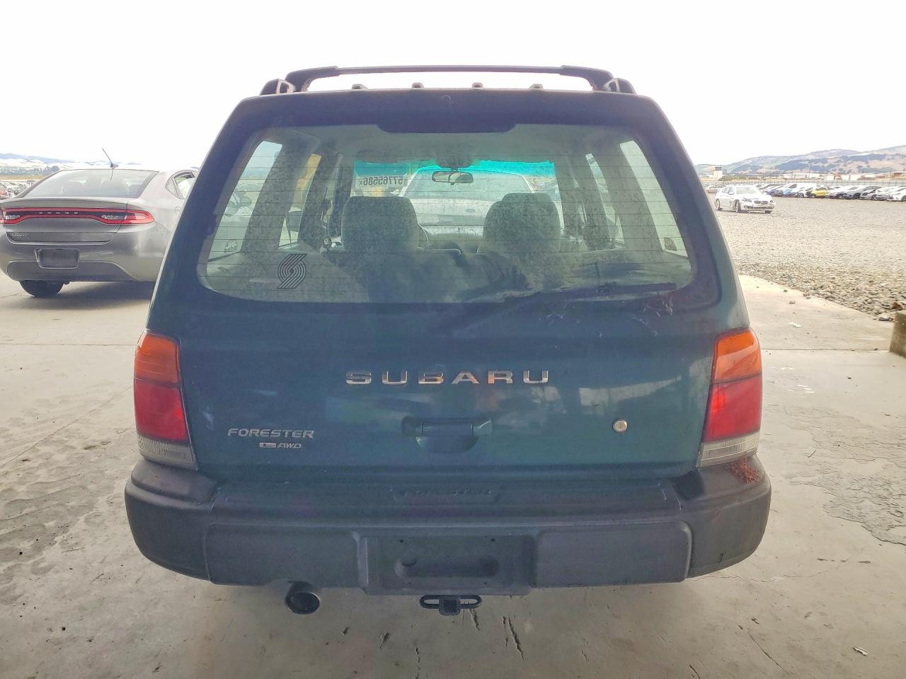 1999 Subaru Forester L Green vin: JF1SF635XXH747527
