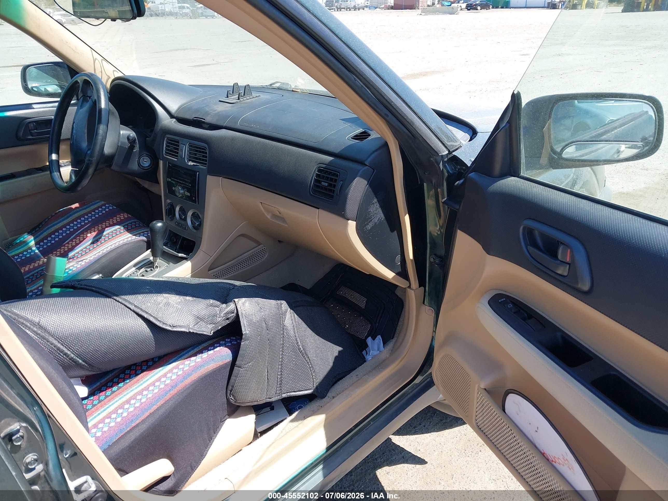 2004 Subaru Forester 2.5x Black vin: JF1SG63644H720339
