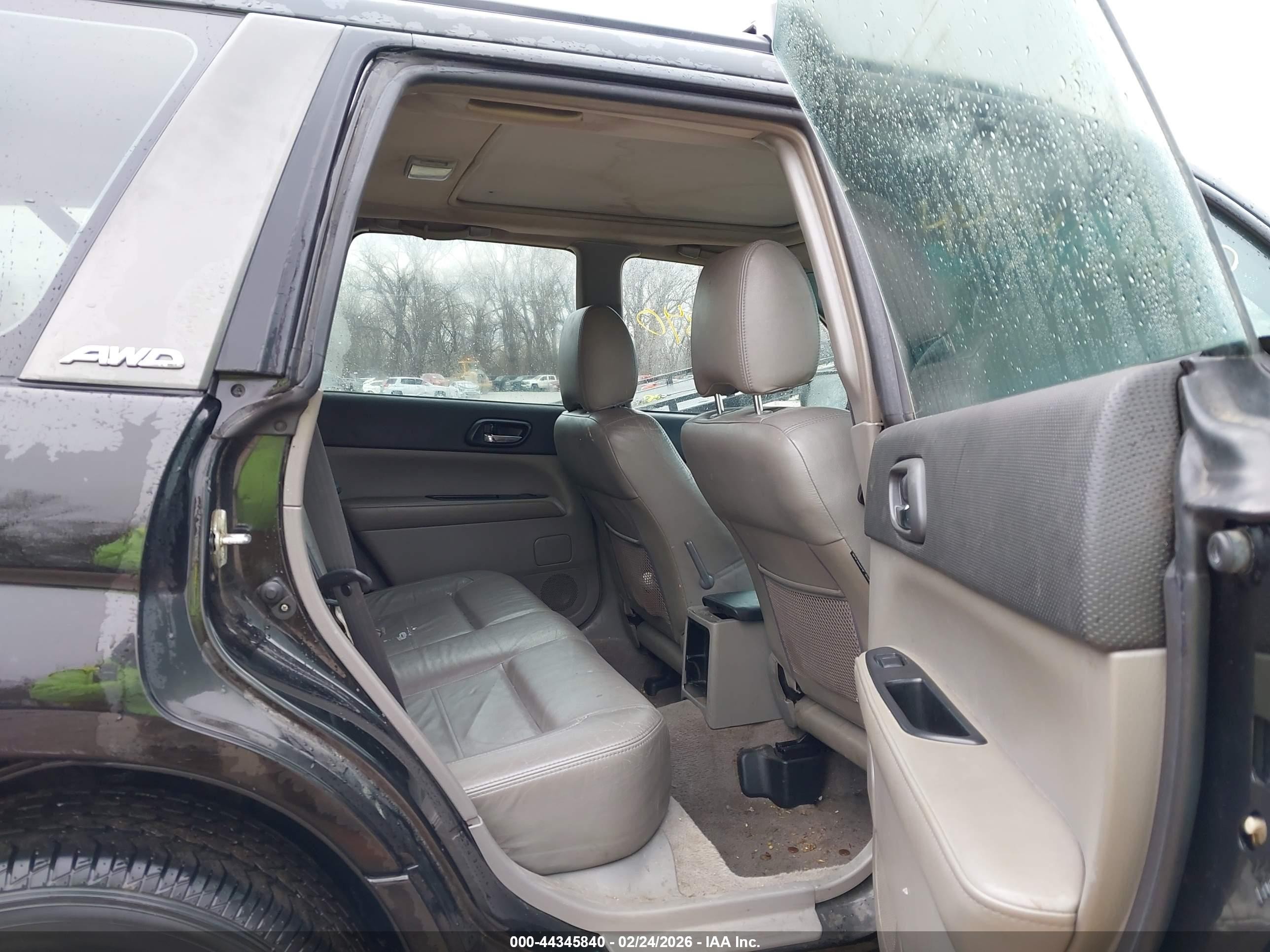 2004 Subaru Forester 2.5xs Black vin: JF1SG65634H754897