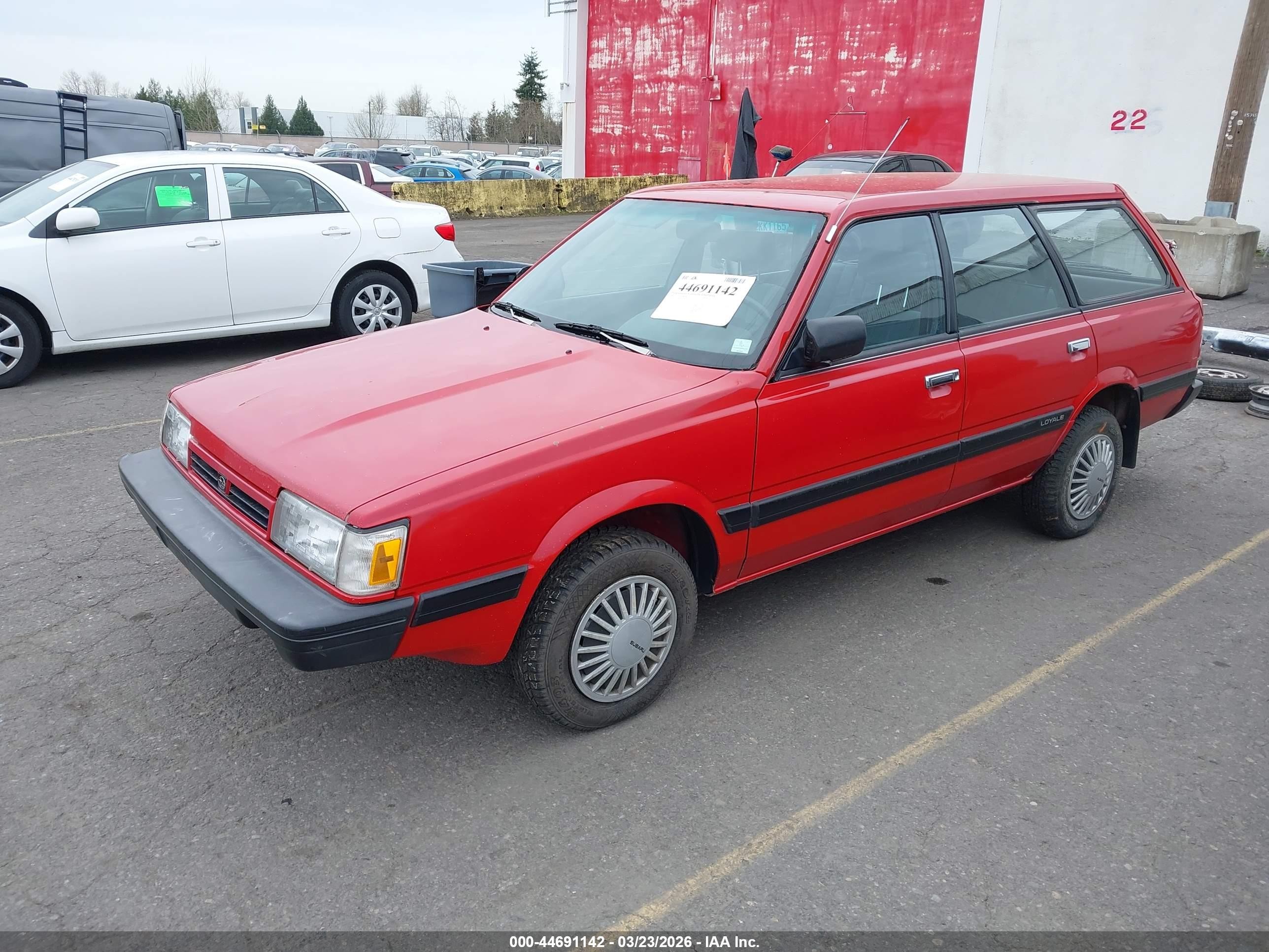 1990 Subaru Loyale   Red vin: JF2AN52B9LD405810