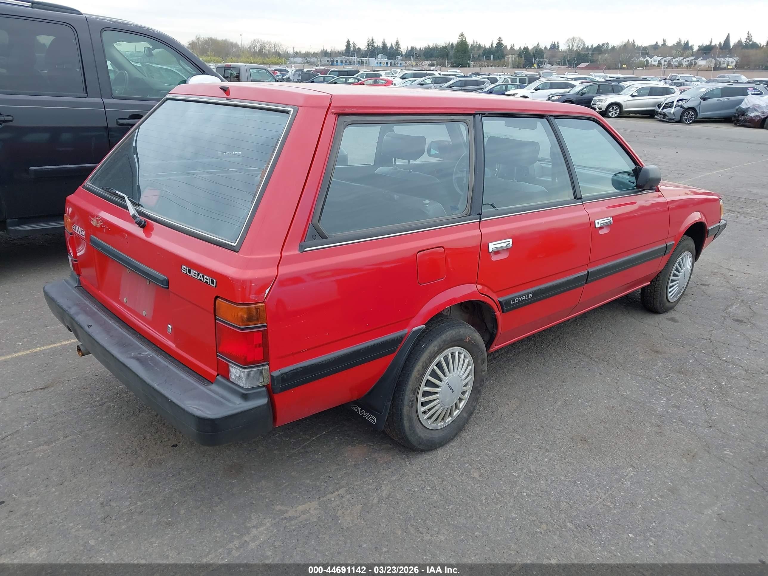 1990 Subaru Loyale   Red vin: JF2AN52B9LD405810