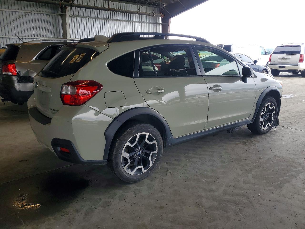 2016 Subaru Crosstrek Limited Tan vin: JF2GPAKC2G8306198