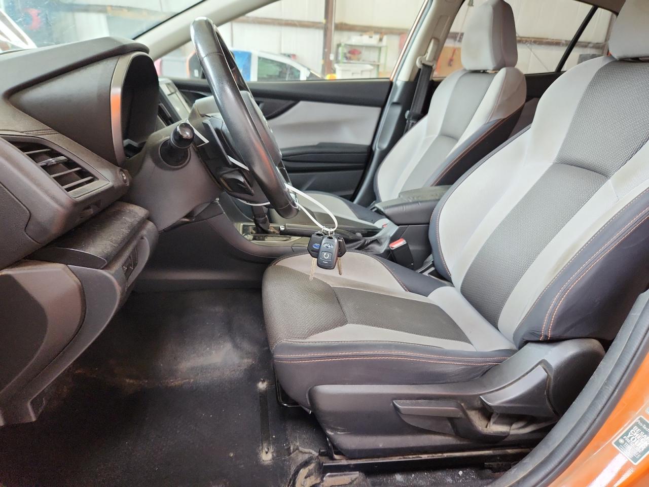 2018 Subaru Crosstrek Premium Orange vin: JF2GTABC3JH314815 Damage: Console Cover, Worn, Acceptable